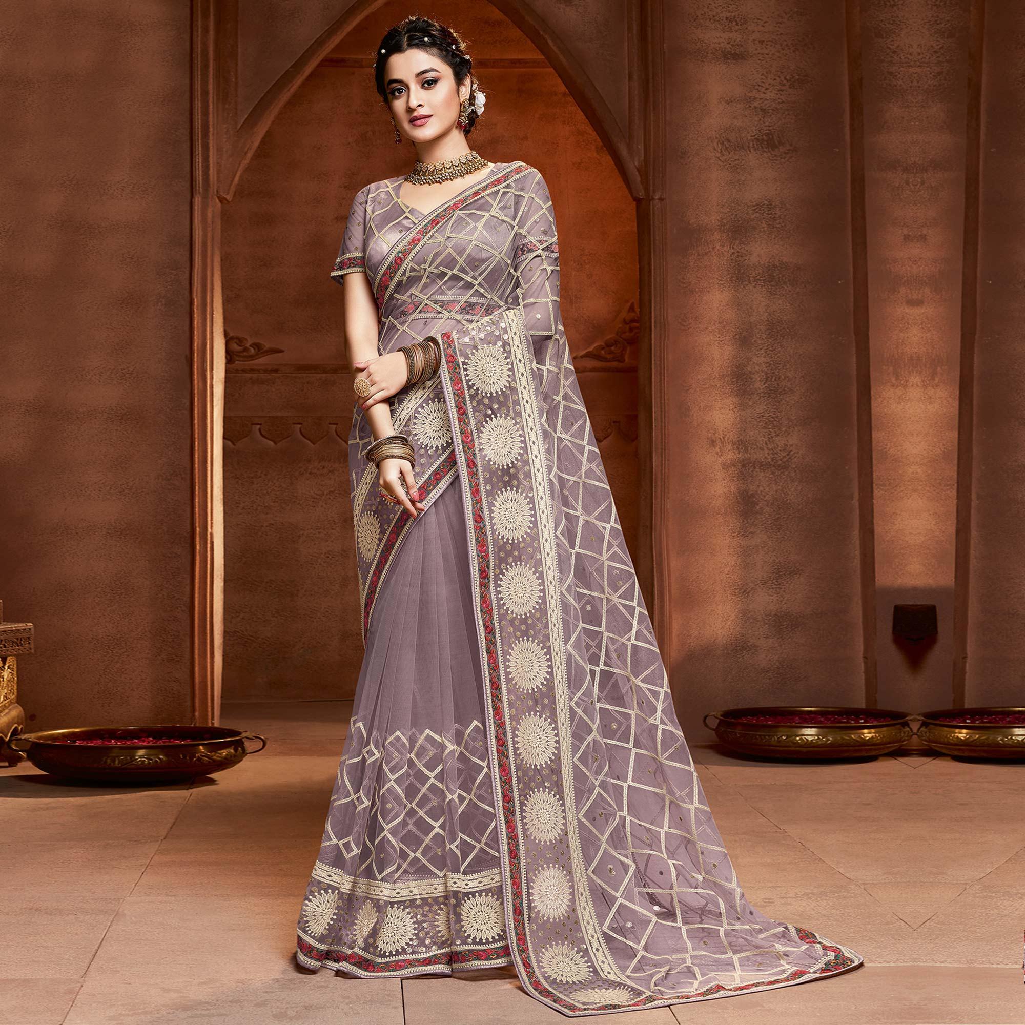 Peachmode Exclusive Mauve Coloured Partywear Embroidered Soft Net Saree