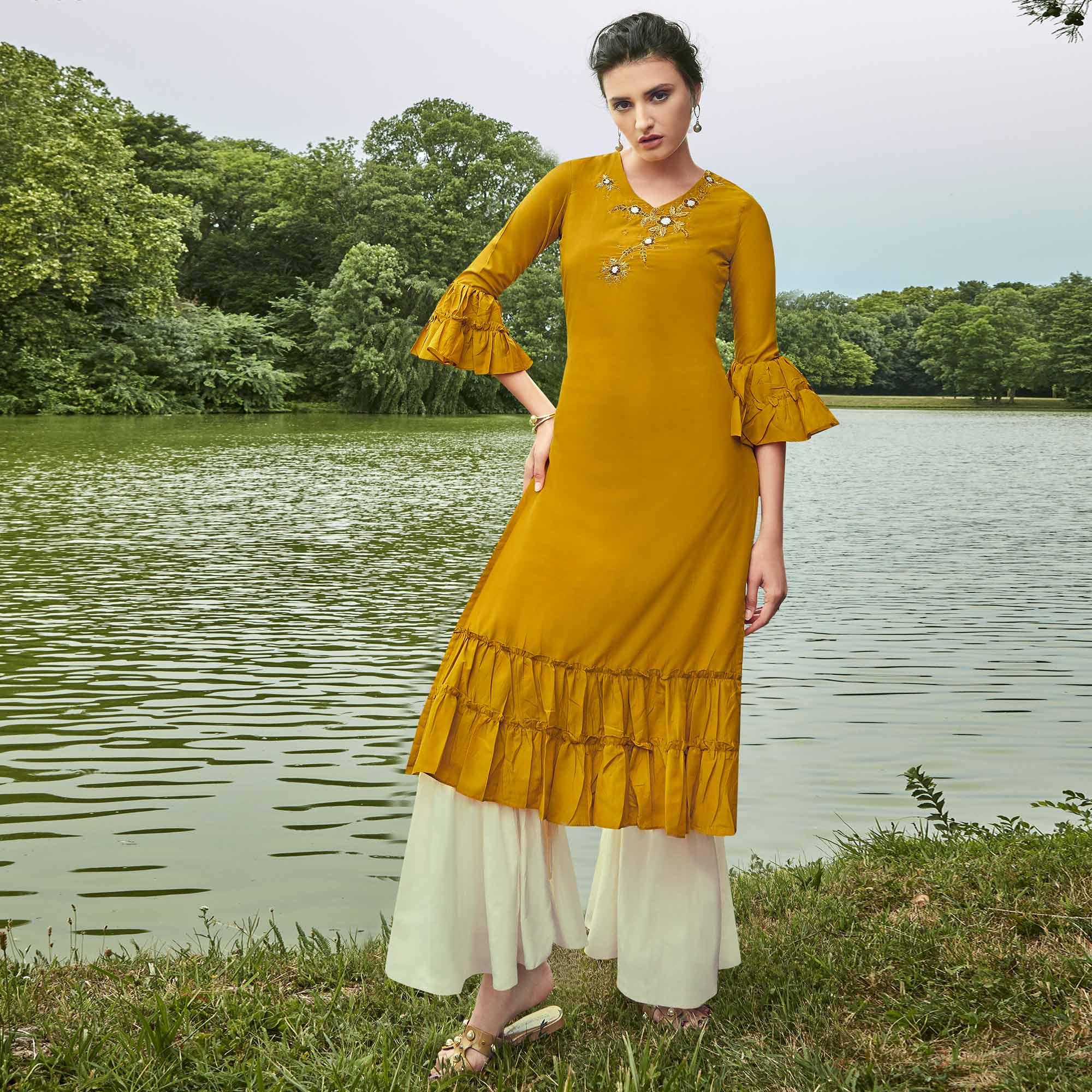 Peachmode Majesty Mustard Yellow Colored Partywear Hand Embroidered Muslin Silk Kurti-Palazzo Set