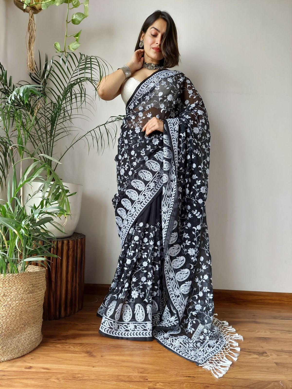 ClothsVilla Black Viscose Organza Saree with Exquisite Chickenkari Embroidery – Paired with Elegant White Silk Blouse and Latkan