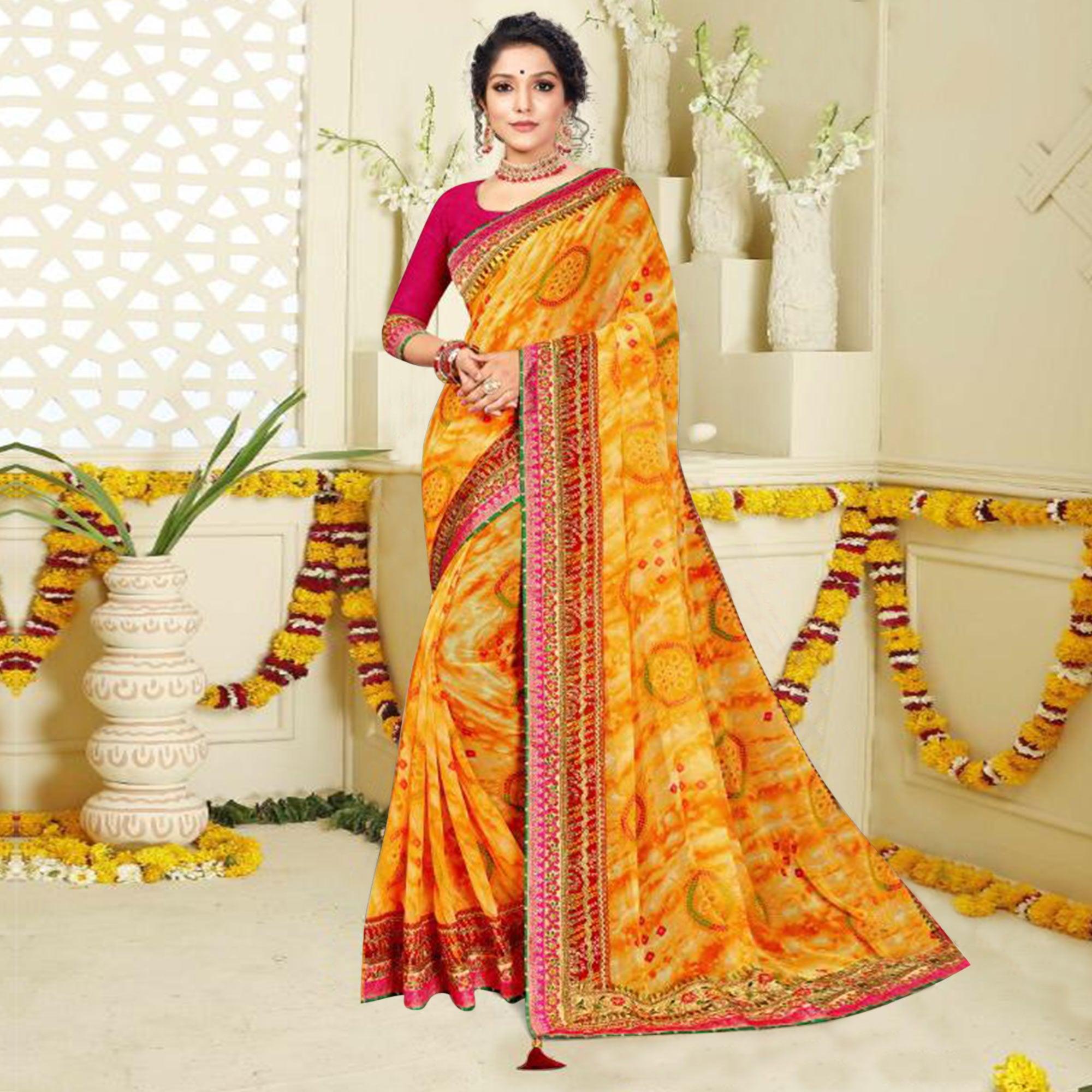 Peachmode Captivating Yellow Colored Festive Wear Bandhani Print With Zari Border Work And Latkan Heavy Georgette Saree