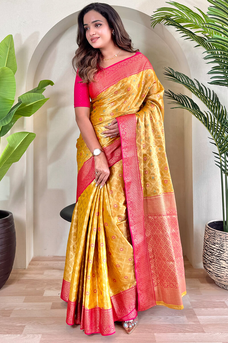 Tasrika Staring Yellow Soft Banarasi Tissue Silk Saree With Ravishing Blouse Piece