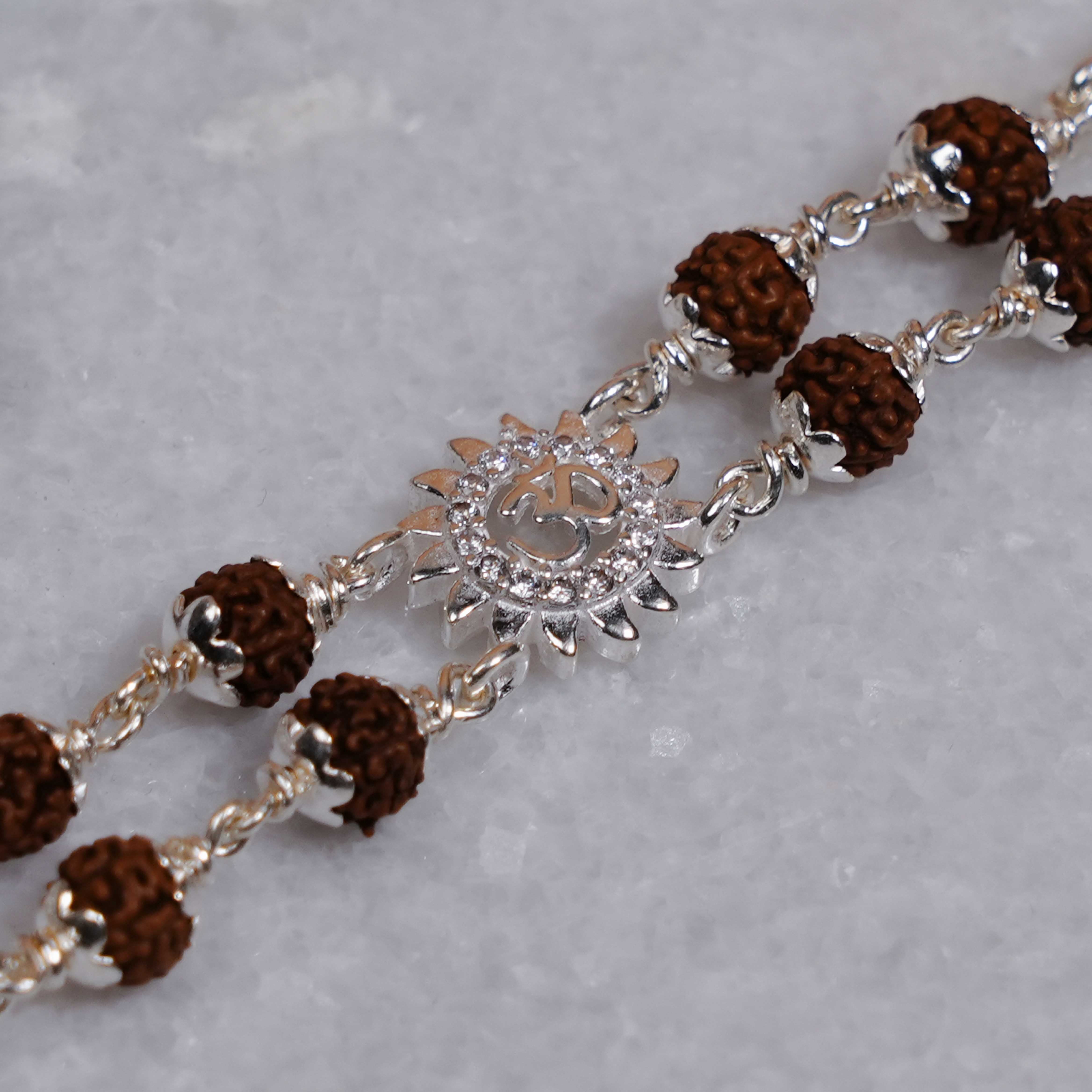 Prinjal Jewellers Rudraksha Silver Om With Sunface Double Line Bracelet