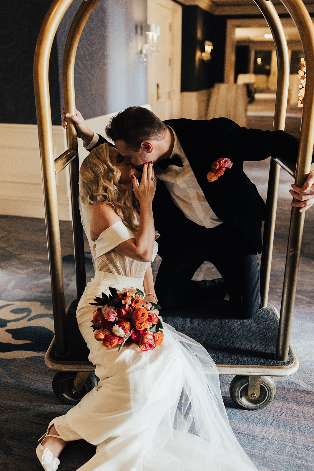 fiftyflowers.com Stylish Orange and Pink Hotel Wedding