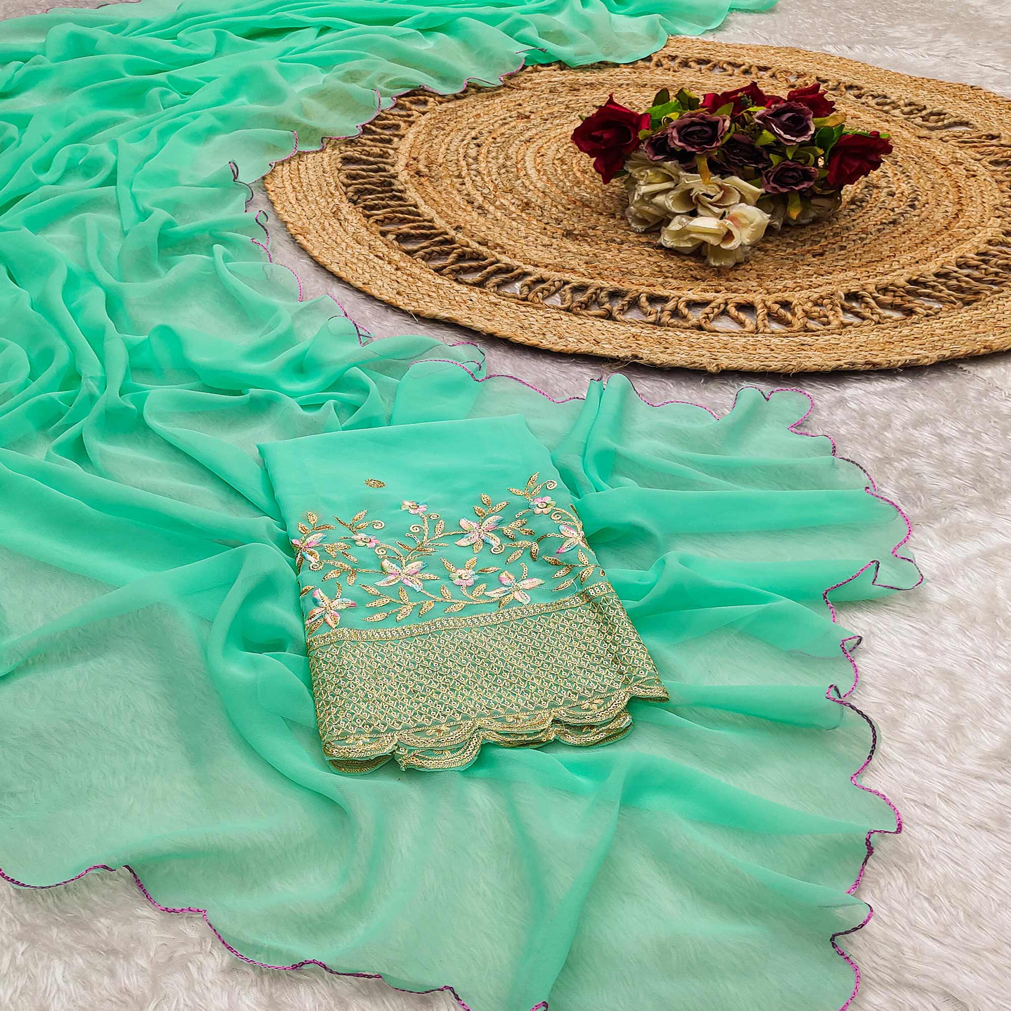 Peachmode Mint Green Solid Georgette Saree With Embroidered Border