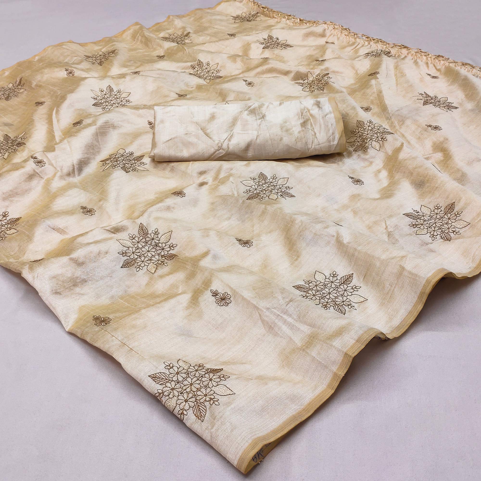 Peachmode Cream Floral Embroidered Assam Silk Saree