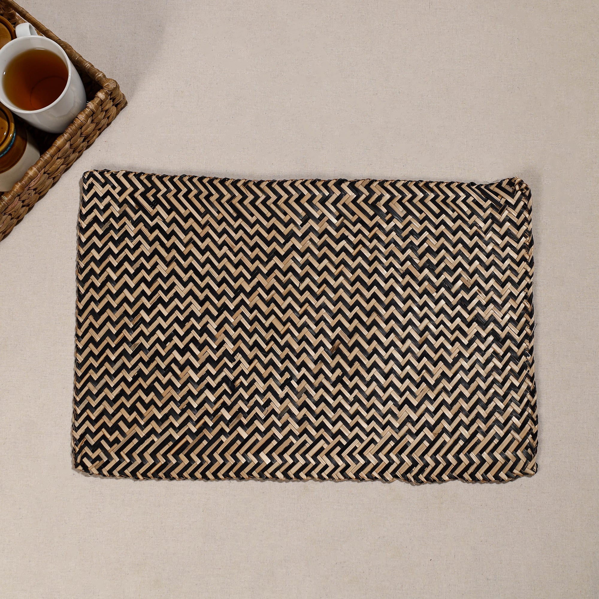 WEAVE INDIA BY SHEIKH MOIDUN NILUFAR Black - Handmade Water Hyacinth Placemat from Assam (20 x 13 in)