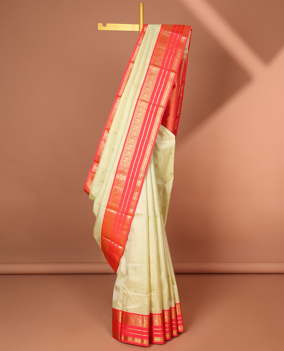 Pothys Cream floral buttas silk saree with korvai border of rekku , mayil design & intricate jaal zari design pallu