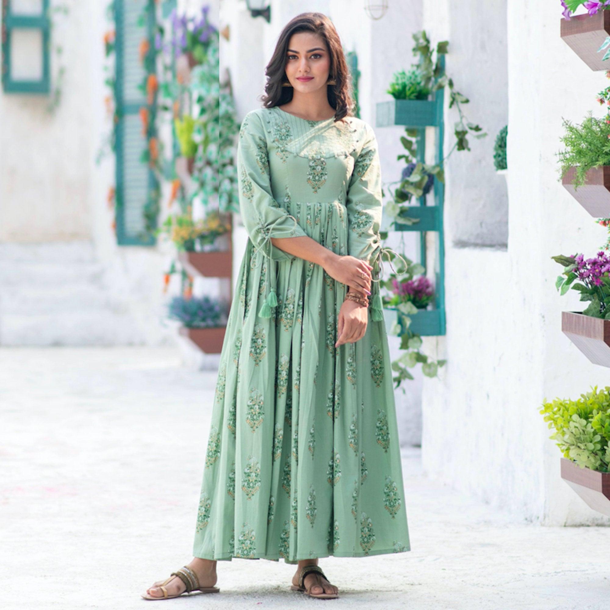 Peachmode Seller Marvellous Moss Green Colored Partywear Digital Printed Pure Muslin Gown
