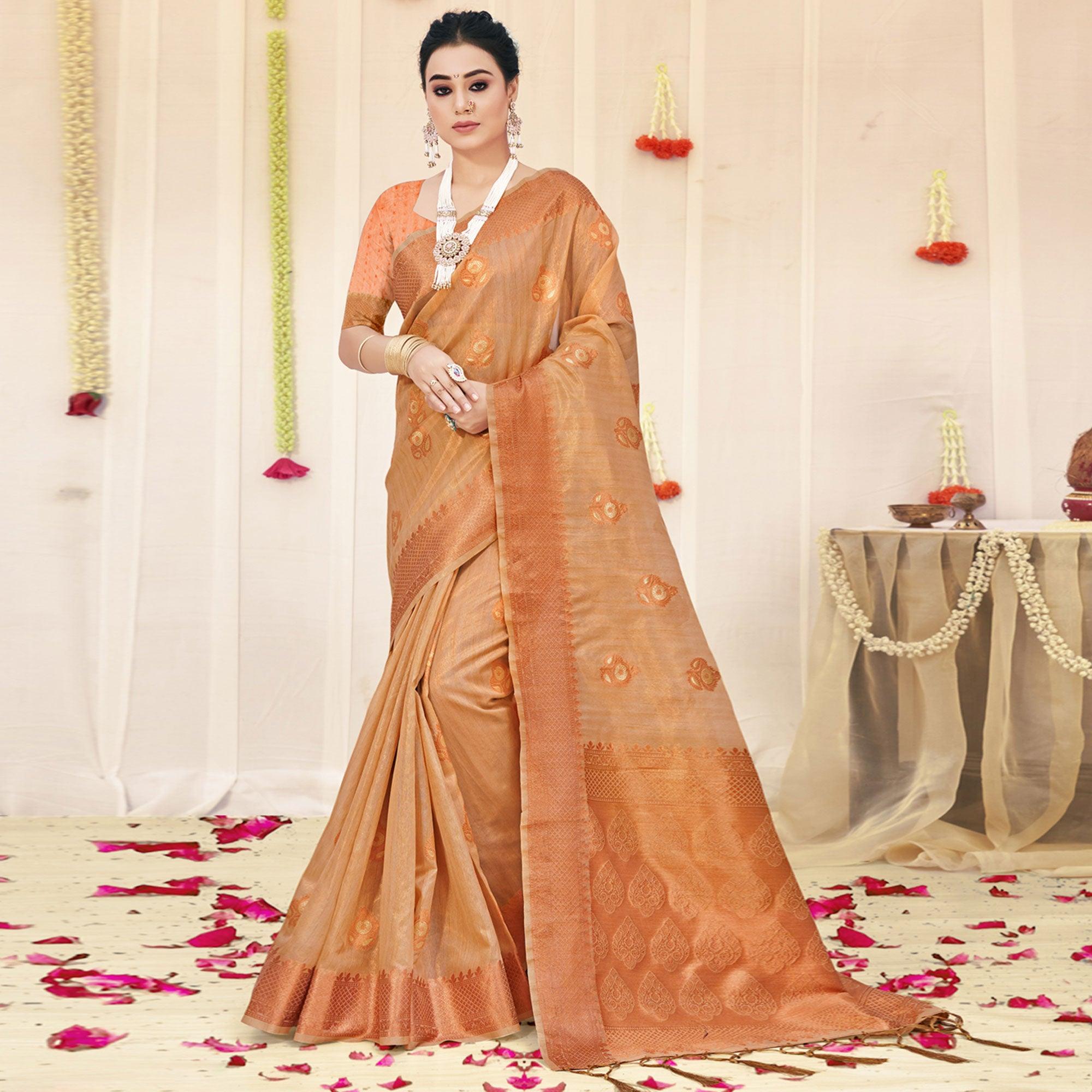 Peachmode Light Peach Woven Organza Saree With Tassels