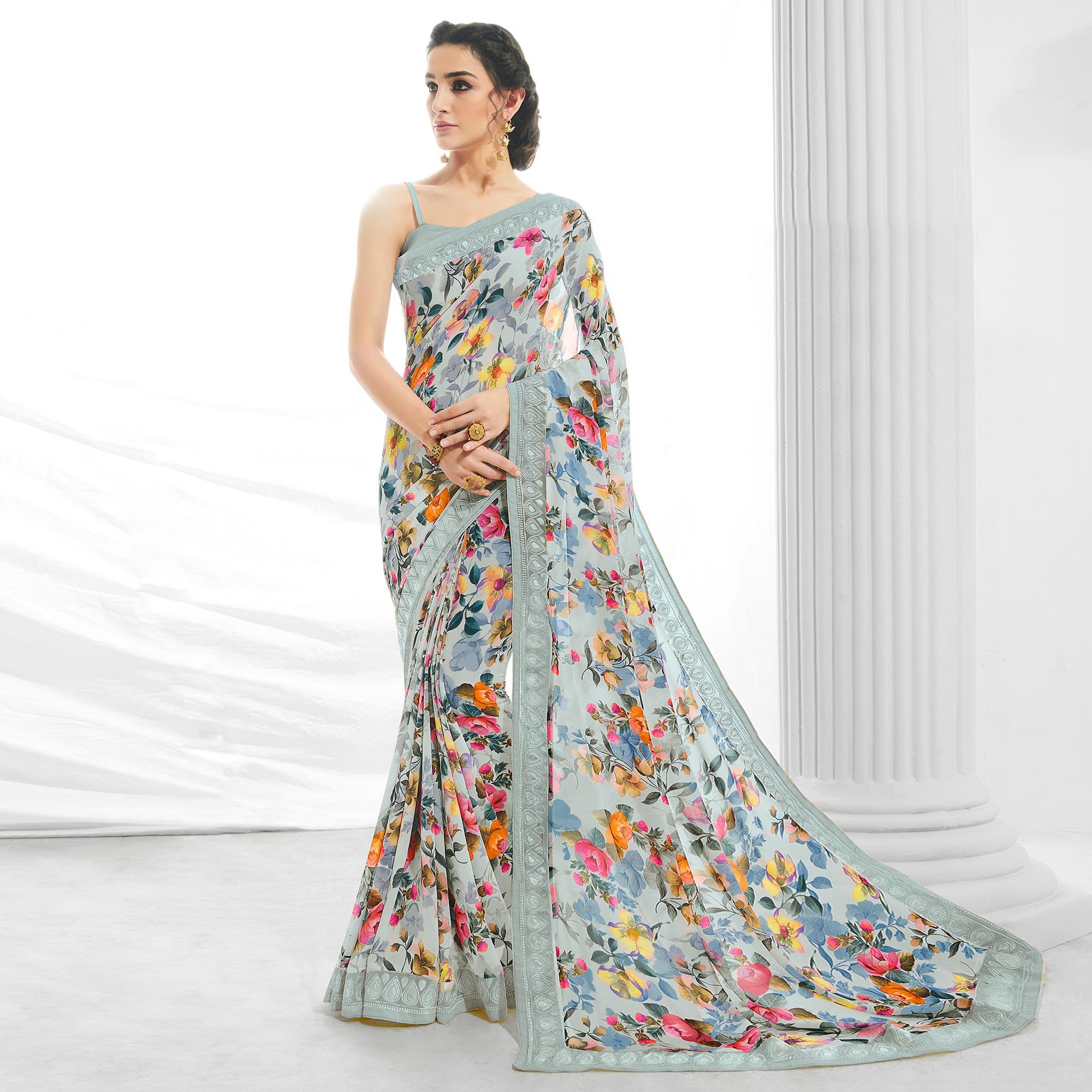 Peachmode Light Blue Floral Printed With Embroidered Border Georgette Saree