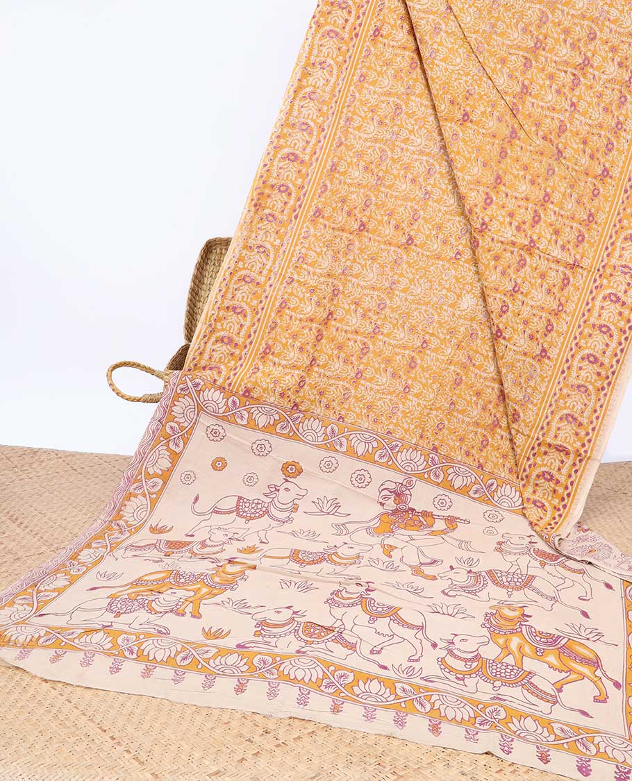 Pothys Orange intricately machine-printed kalamkari cotton saree, contrast Pichwai cow & God Krishna motif pallu