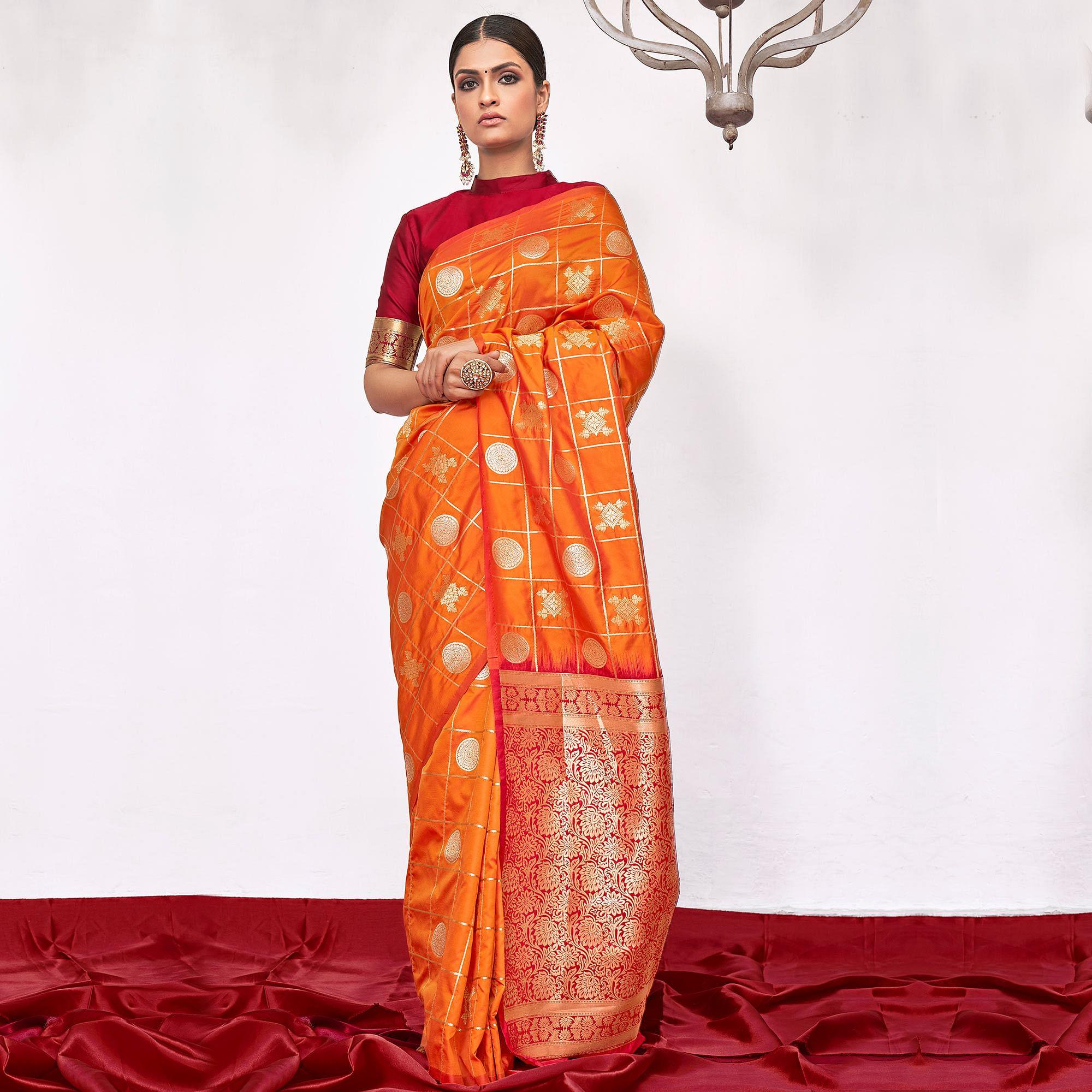 Peachmode Entrancing Orange Colored Festive Wear Woven Silk Saree