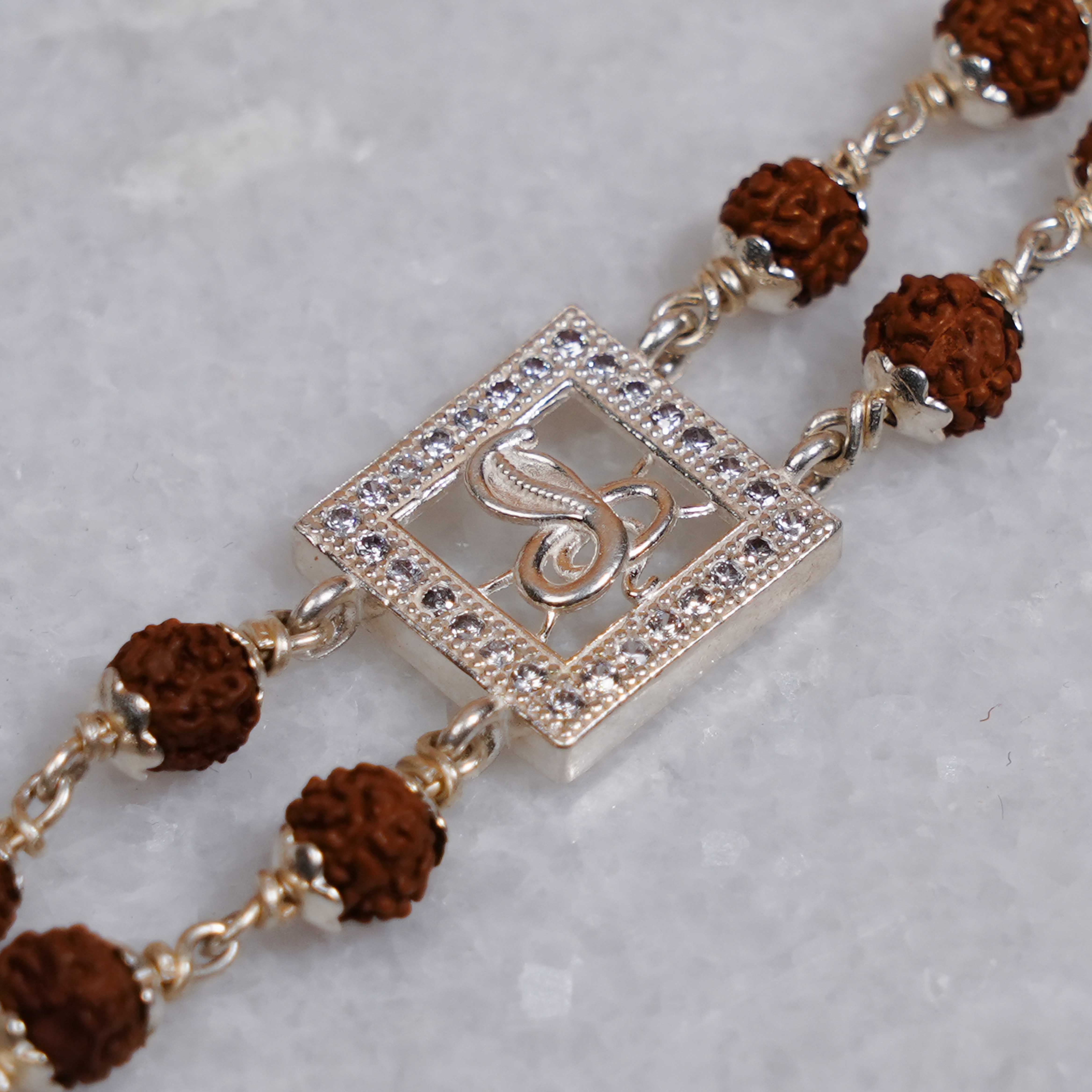 Prinjal Jewellers Rudraksha Silver bracelet with central Naag double line for men