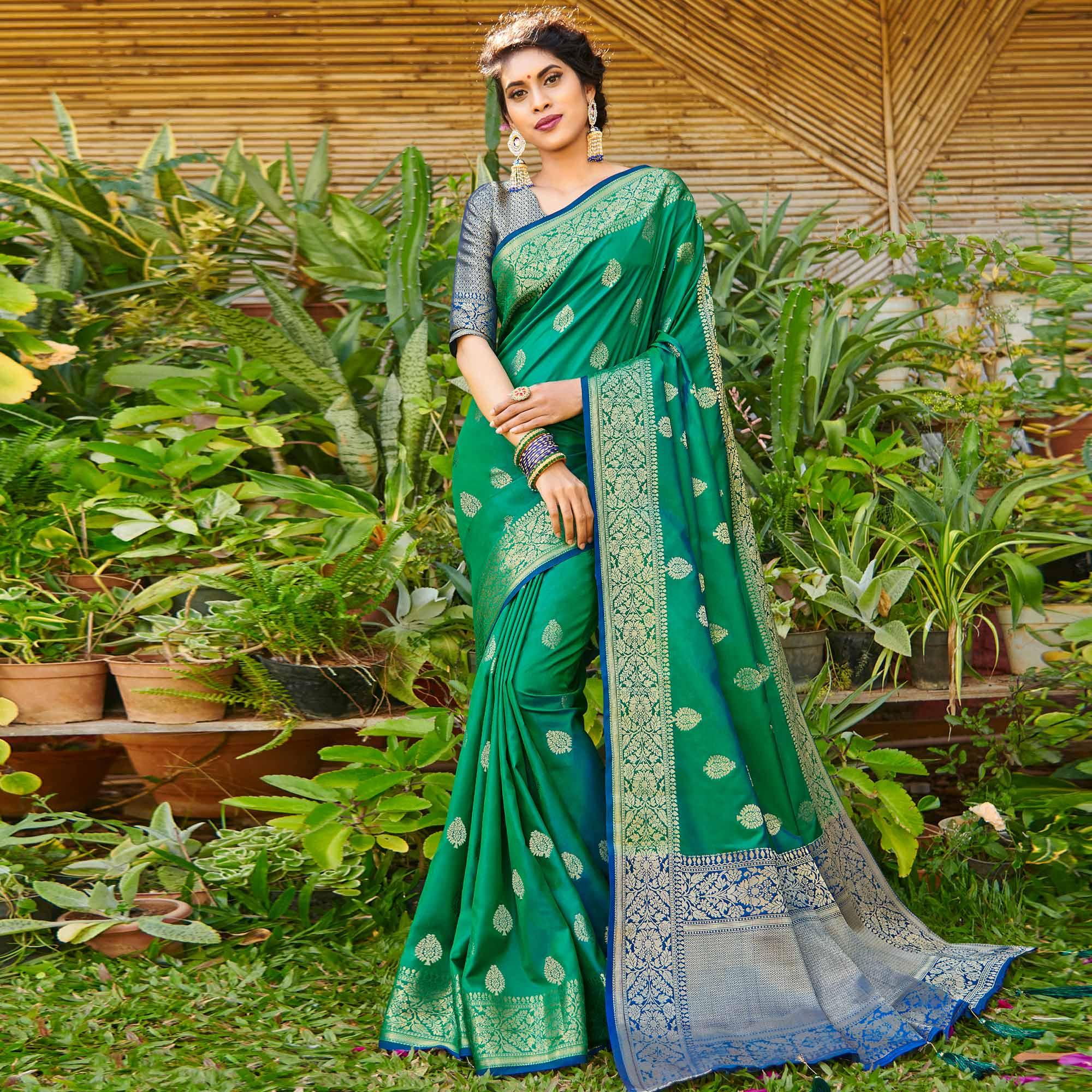 Peachmode Mesmeric Green Colored Festive Wear Woven Silk Saree