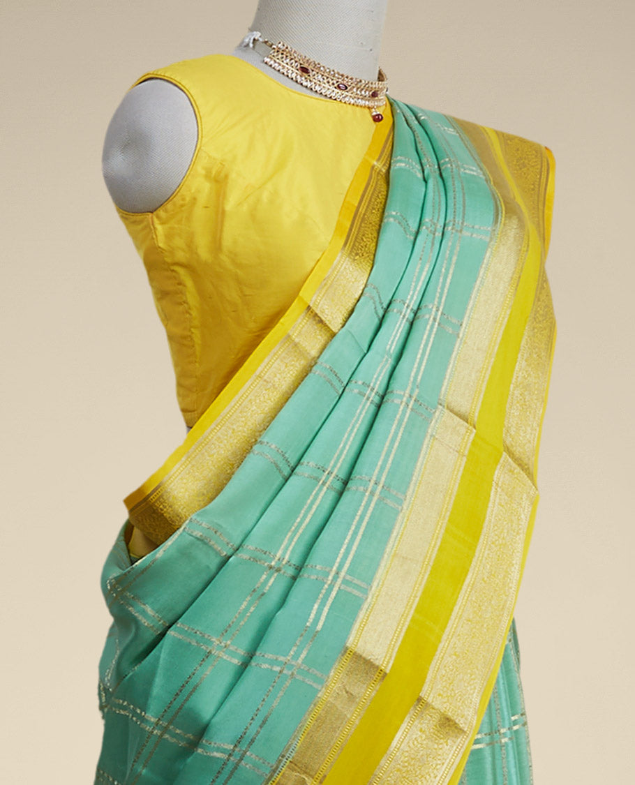 Pothys Green checked mysore silk saree with contrast intricate zari border