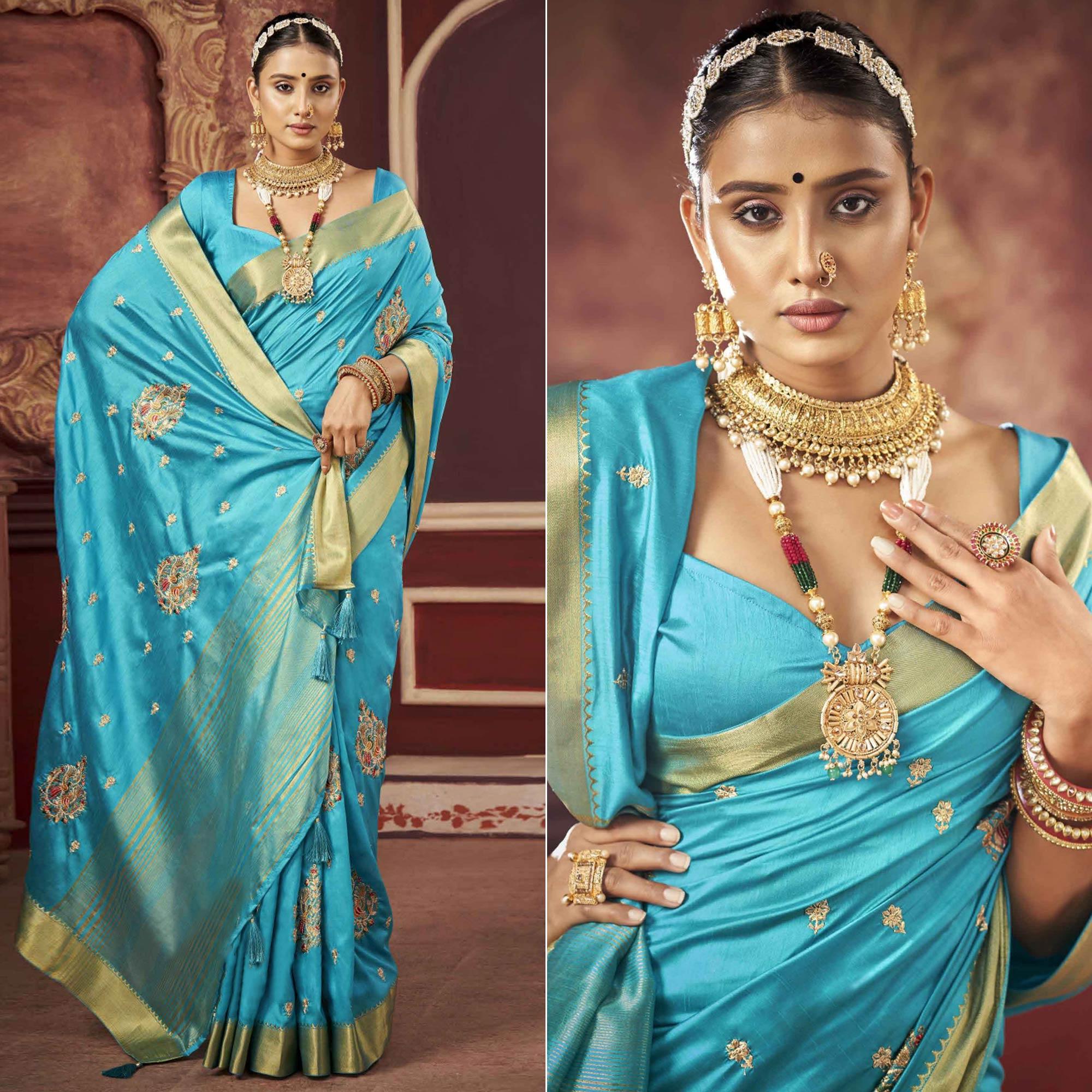 Peachmode Blue Woven-Embroidered Raw Silk Saree With Tassels