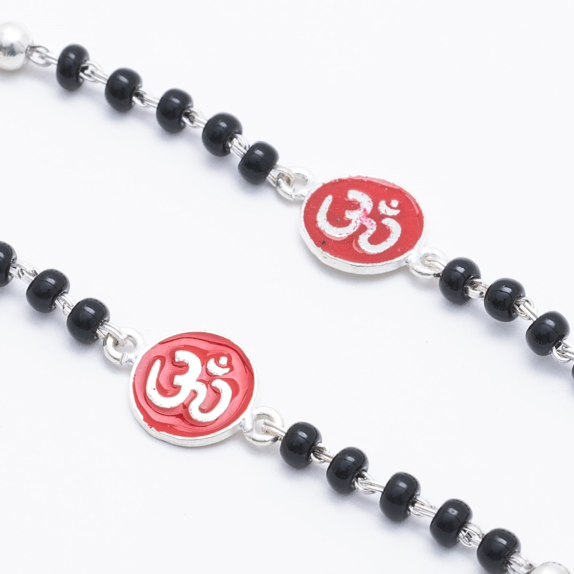 Prinjal Jewellers Real black beads Om silver nazariya for kids