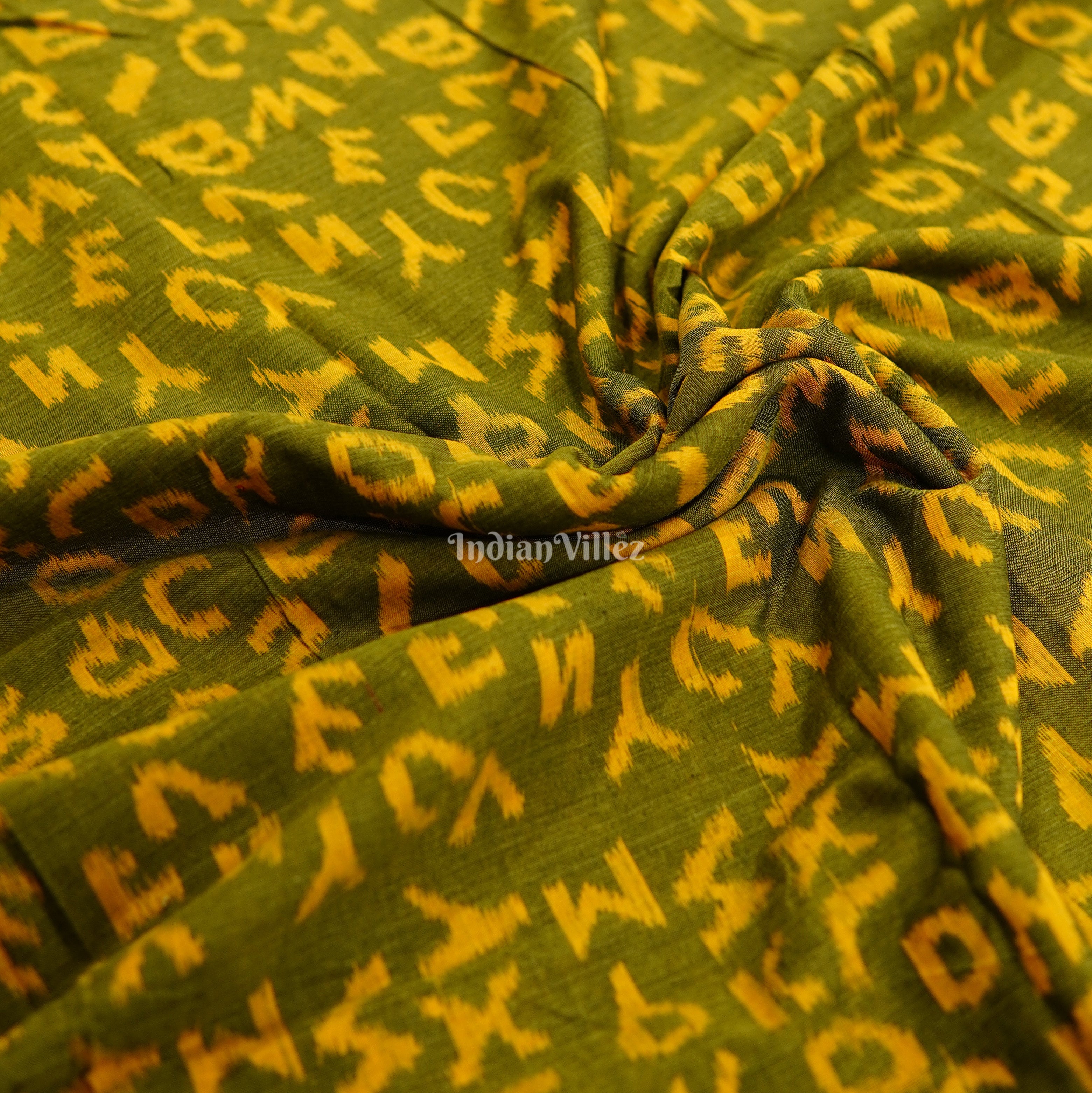 IndianVillèz Mehndi Green English Alphabet Sambalpuri Cotton Fabric