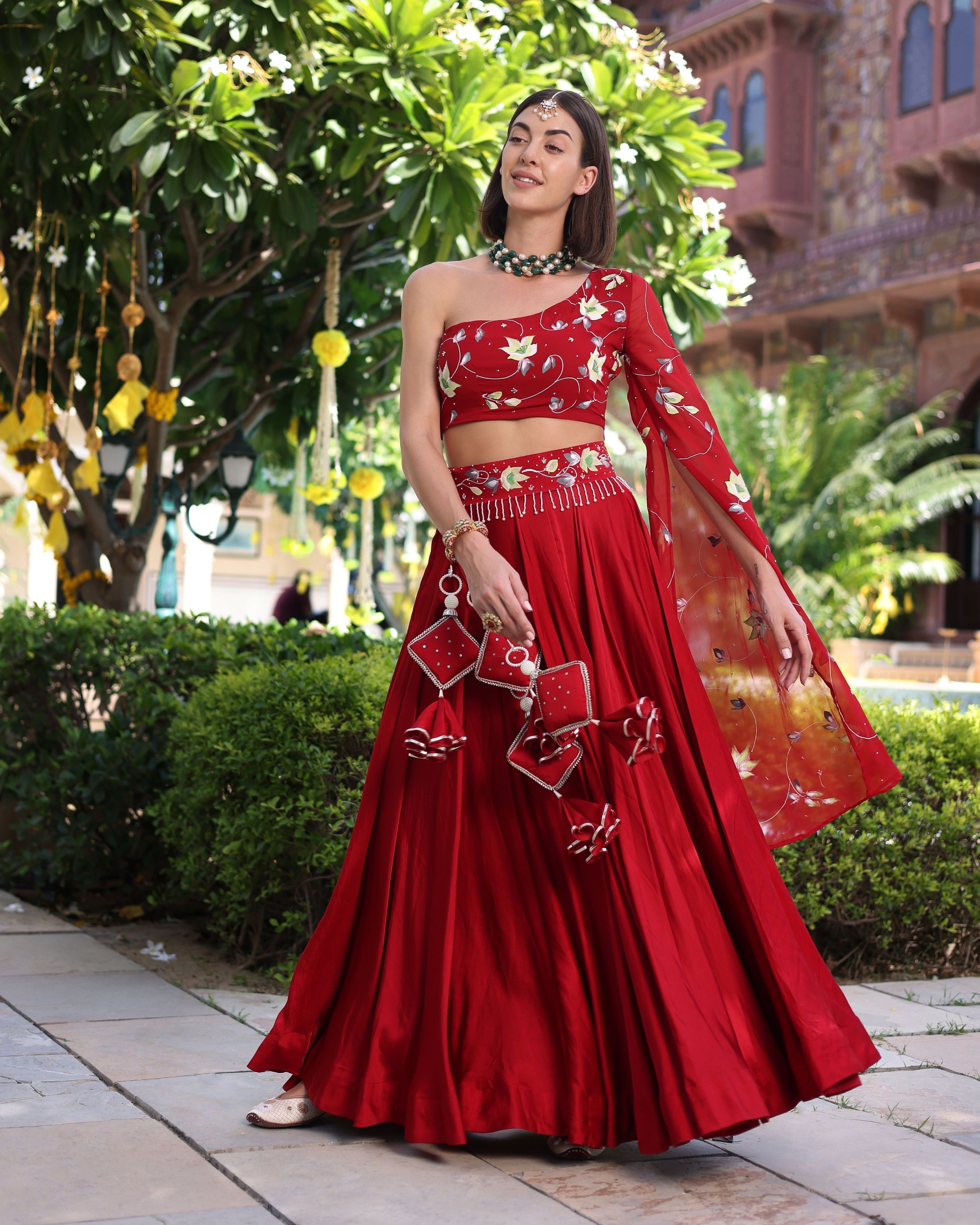 Aachho Rutvi Red Handpainted Satin Lehenga Set