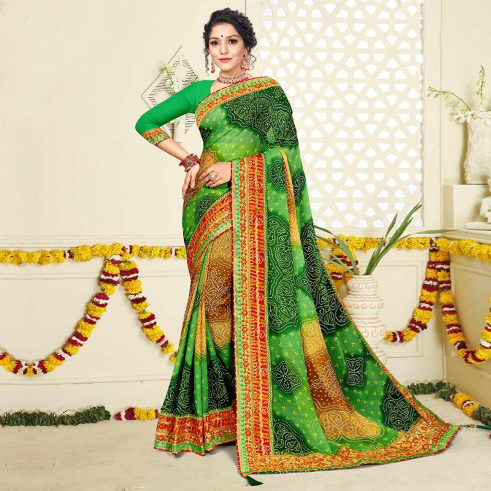 Peachmode Fantastic Green Colored Festive Wear Bandhani Print With Zari Border Work And Latkan Heavy Georgette Saree