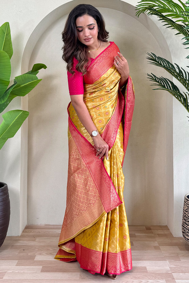 Tasrika Staring Yellow Soft Banarasi Tissue Silk Saree With Ravishing Blouse Piece - view 3