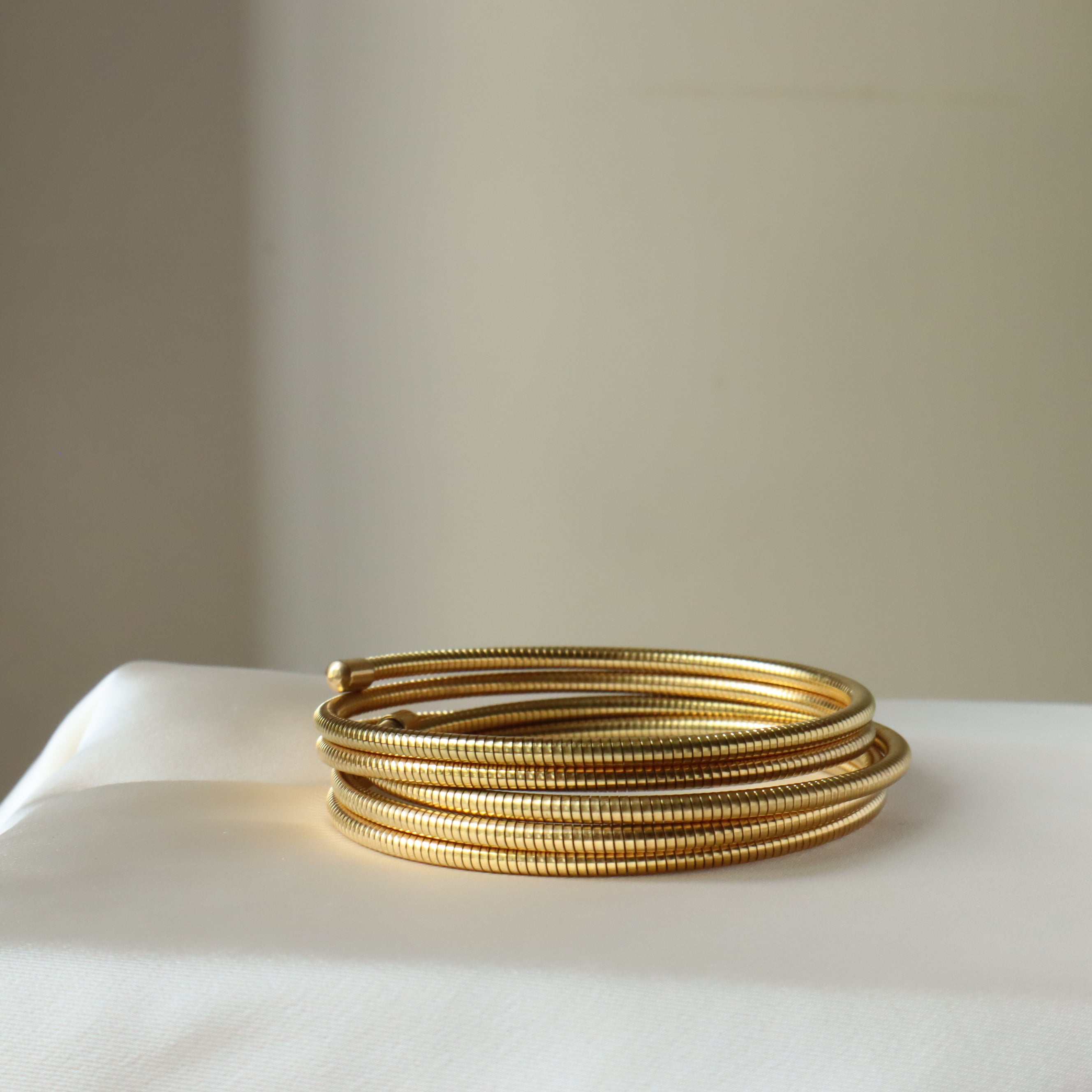 Ash Designs Sleek Spiral 18K Gold Plated Bangle
