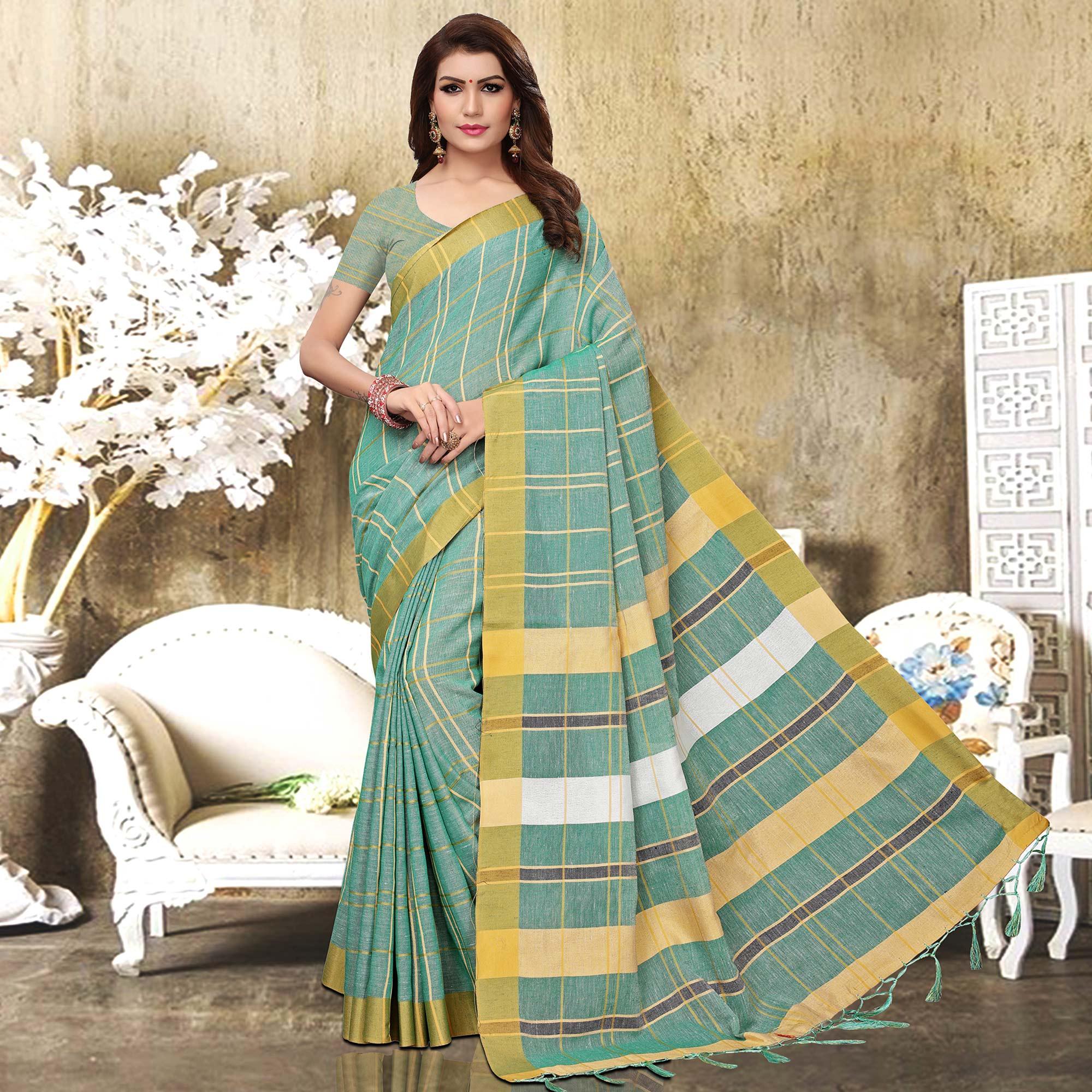 Peachmode Jazzy Pastel Aqua Blue Colored Festive Wear Checks Print Pure Linen Saree