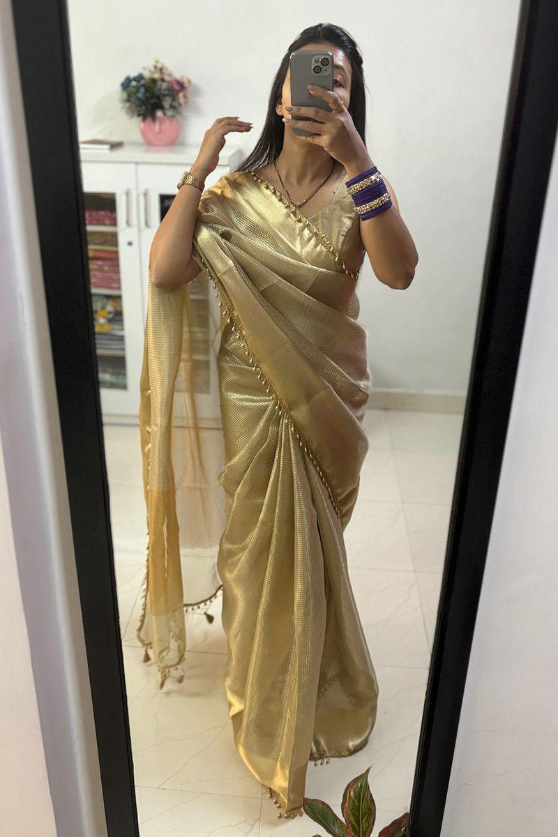 Shubh Fancifull Golden Soft Tissue Silk Saree With Demesne Blouse Piece
