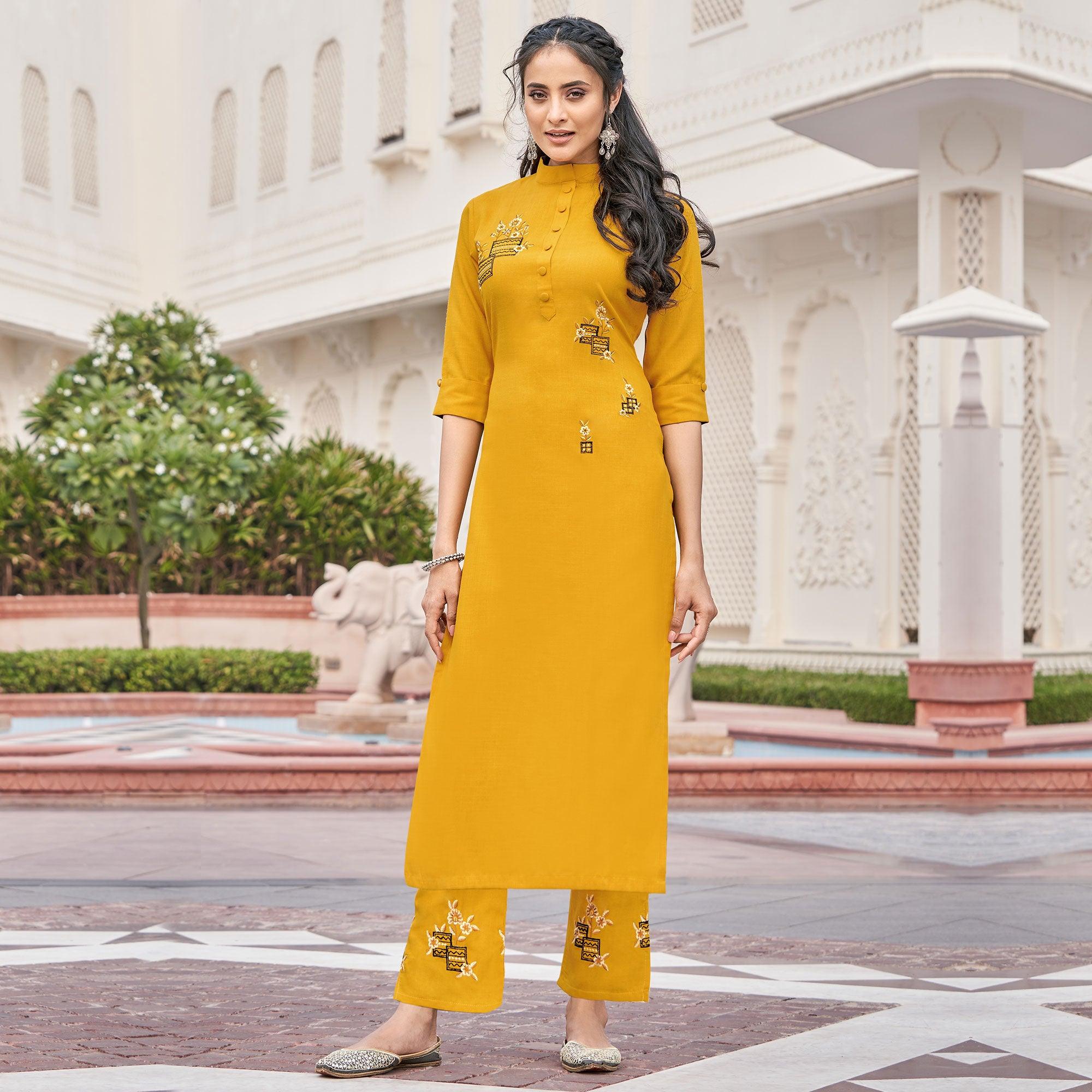 Peachmode Seller Imposing Mutard Yellow Colored Partywear Embroidered Cotton Slub Kurti Palazzo Set