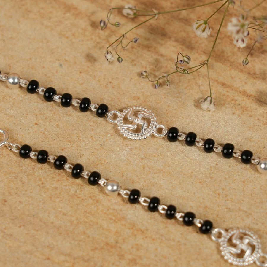 Prinjal Jewellers Black Beads and Silver Swastik Nazariya for Kids