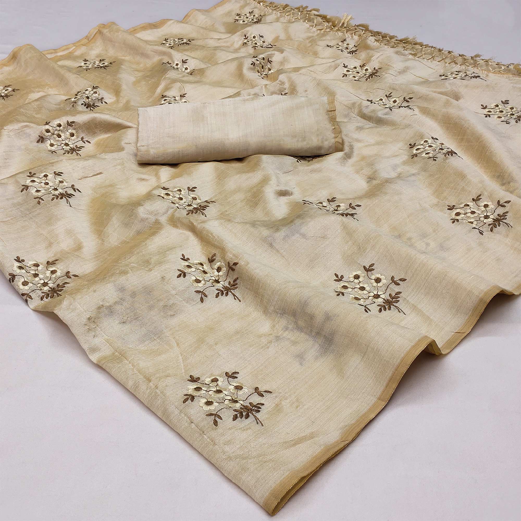 Peachmode Cream Floral Embroidered Khaadi Saree