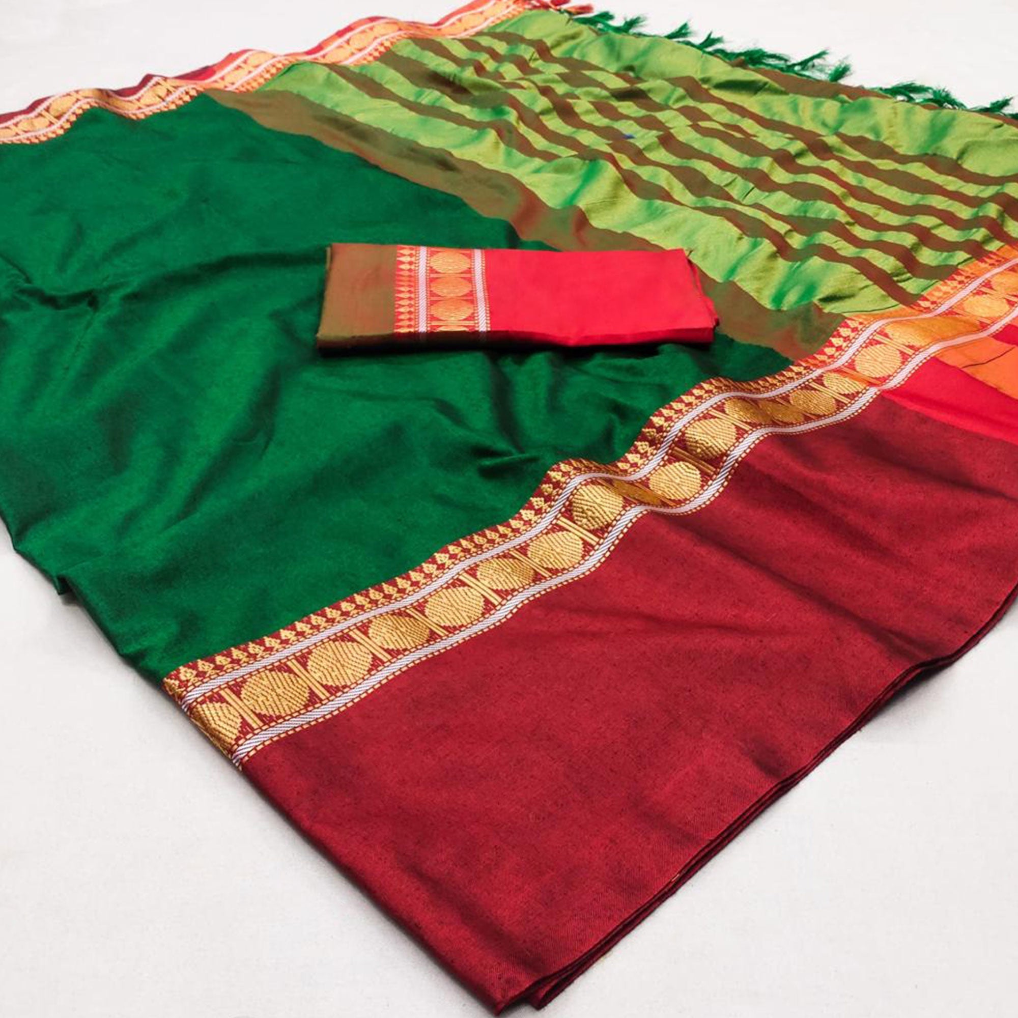 Peachmode Dark Green Woven Cotton Silk Saree With Tassels