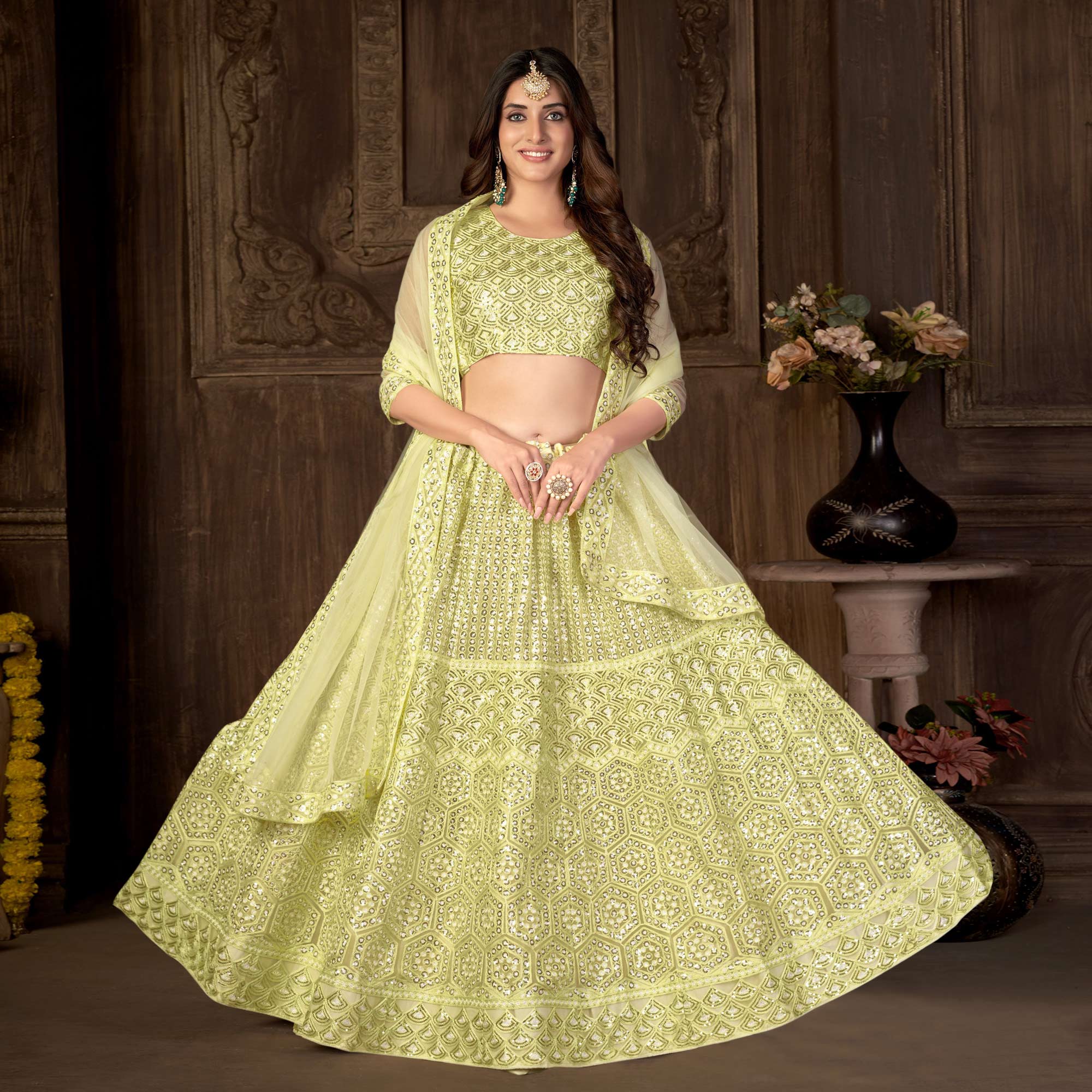 Peachmode Lemon Yellow Sequins Embroidered Netted Lehenga Choli