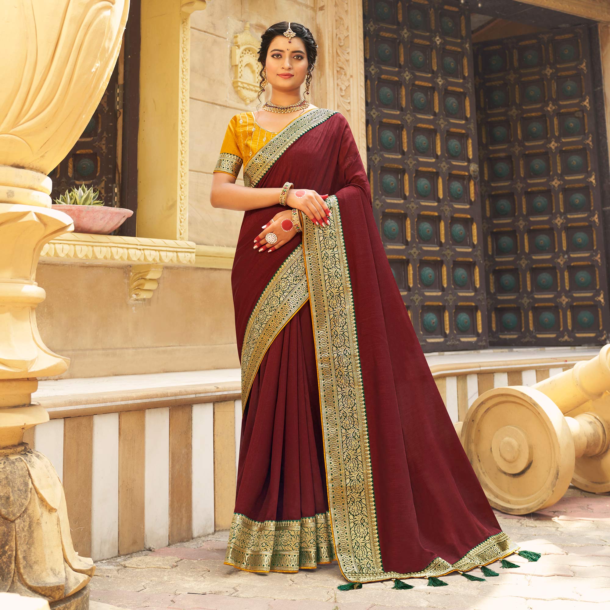 Peachmode Maroon Solid With Embroidered Border Vichitra Silk Saree