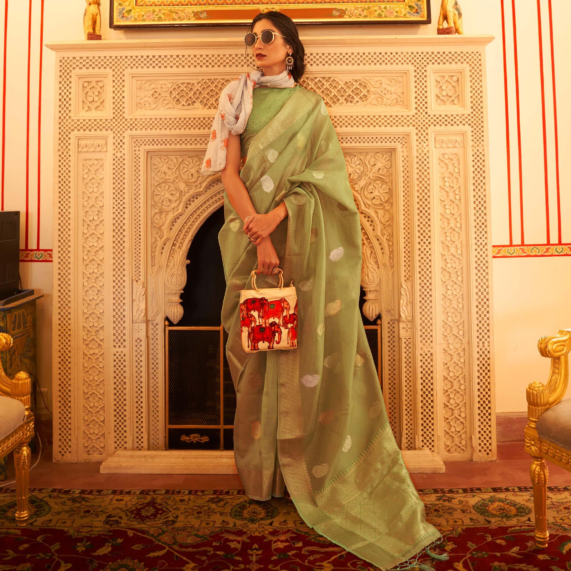 Peachmode Mint Green Woven Linen Saree With Tassels