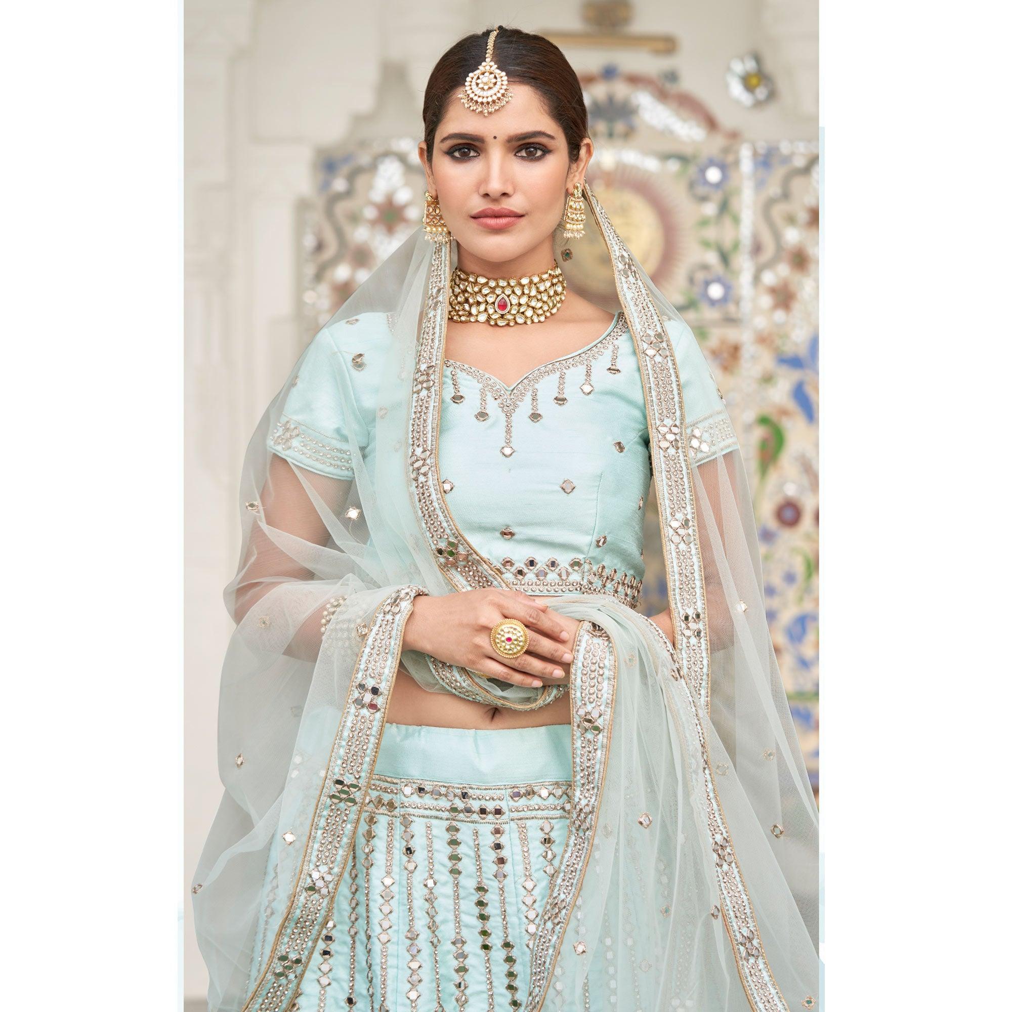 Peachmode Intricate Ice Blue Coloured Wedding Wear Mirror Work Heavy Silk Lehenga Choli - view 2