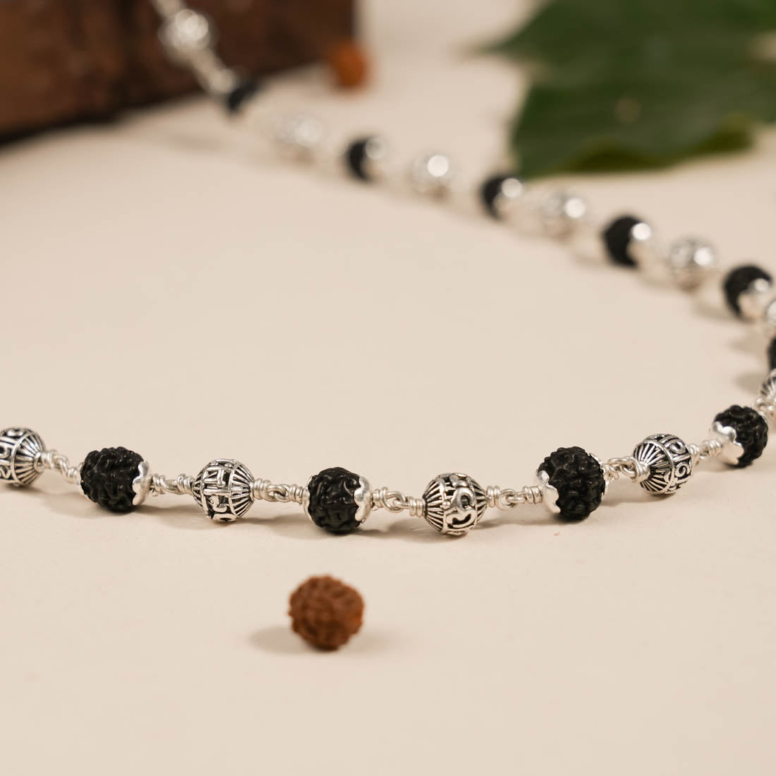 Prinjal Jewellers Black Rudraksha With Om Namah Shivay Silver Beads Mala