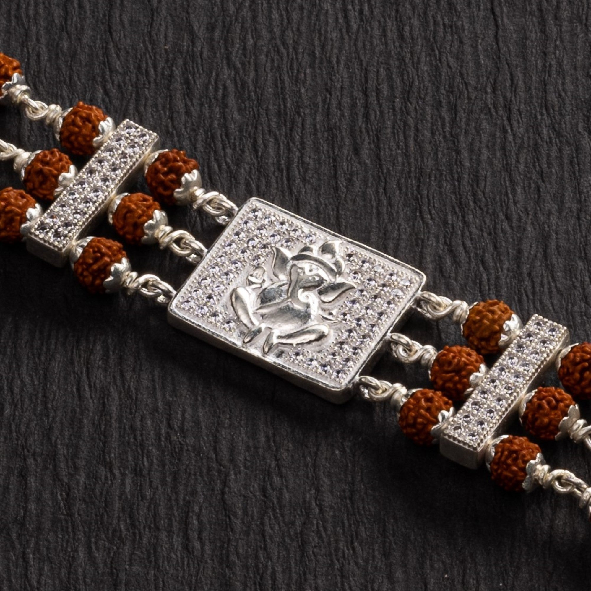 Prinjal Jewellers Rudraksha Silver Brooch Ganesh Triple Line Bracelet