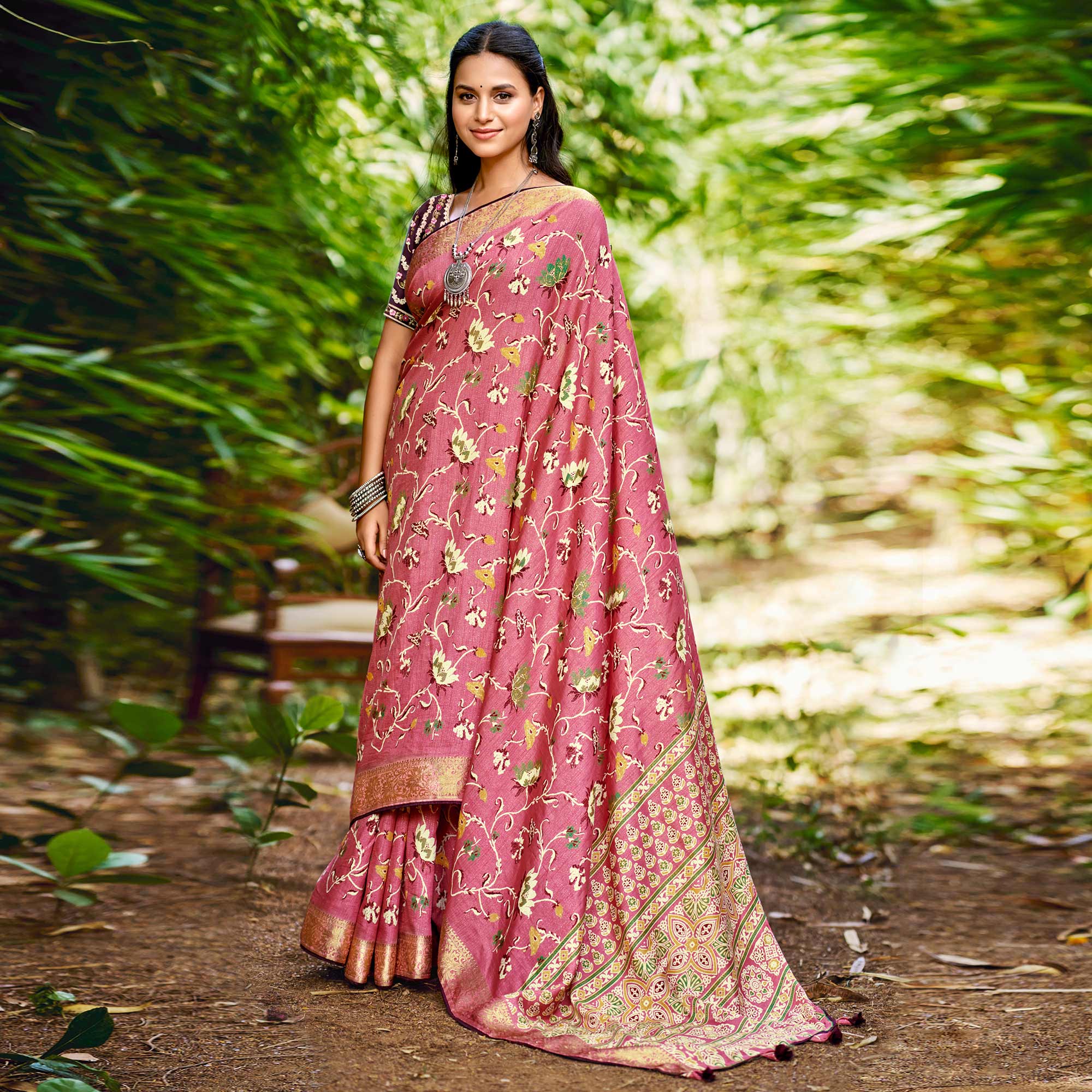 Peachmode Dusty Pink Floral Woven Dola Silk Saree With Tassels