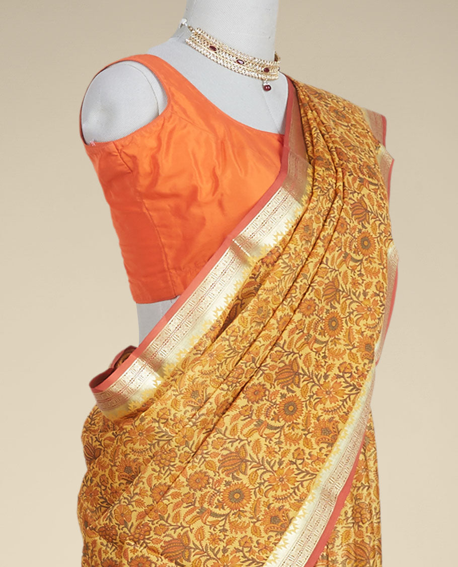 Pothys orange floral printed silk saree with contrast intricate zari design border