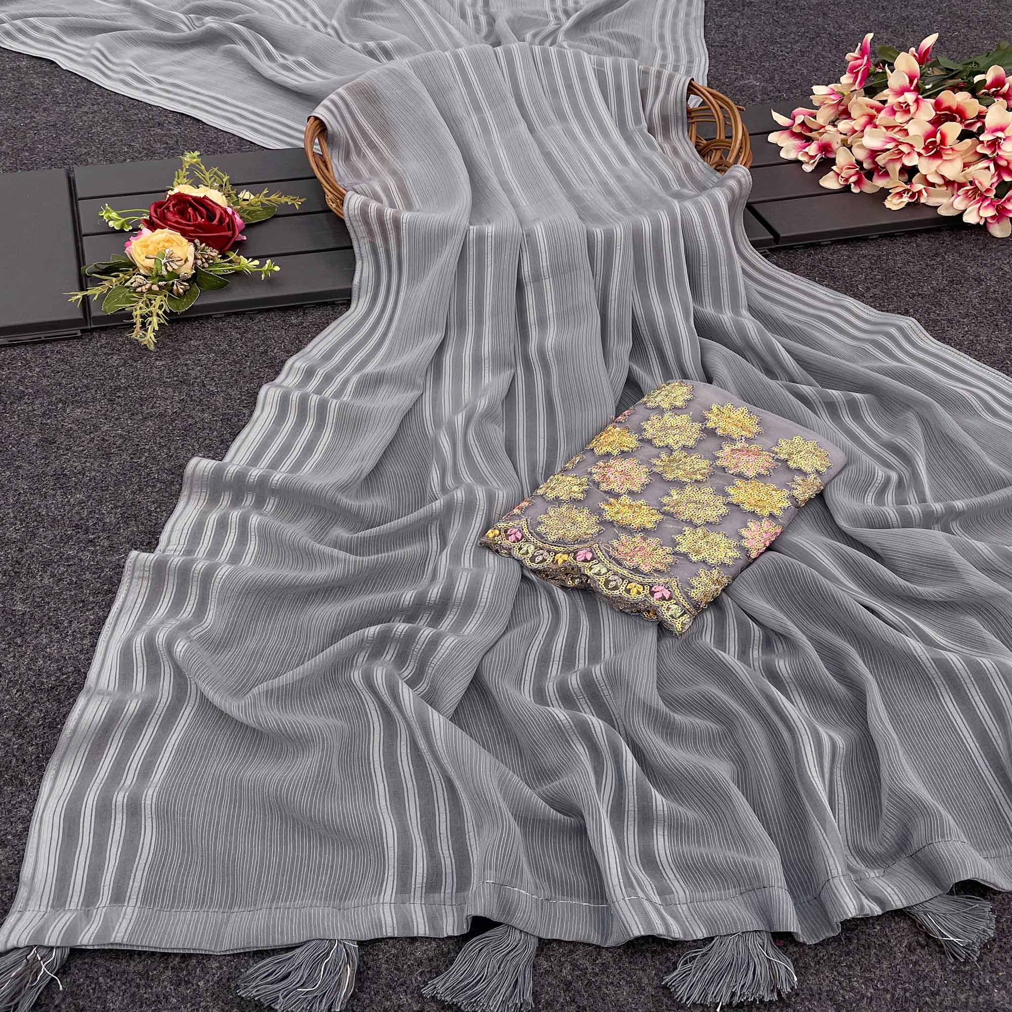 Peachmode Grey Zari Striped Woven Georgette Saree