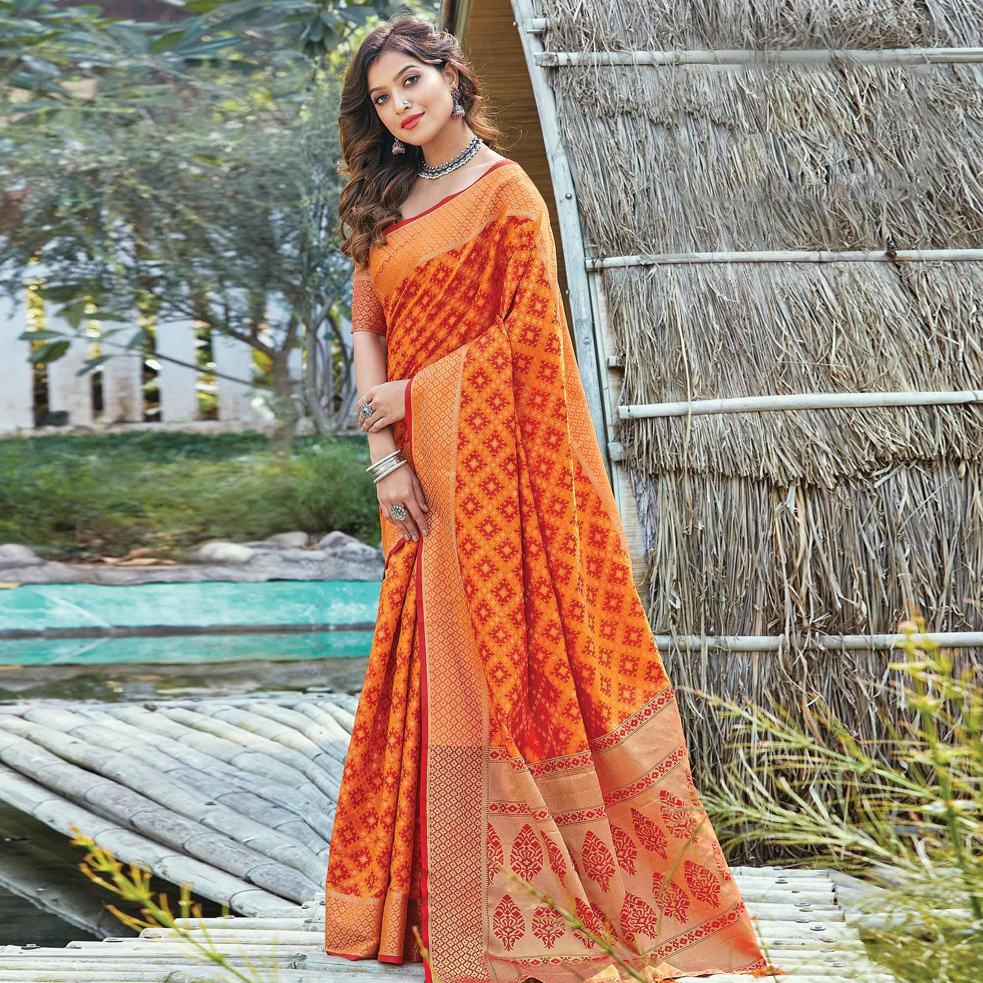 Peachmode Ideal Orange Colored Festive Wear Patan Patola Silk Saree