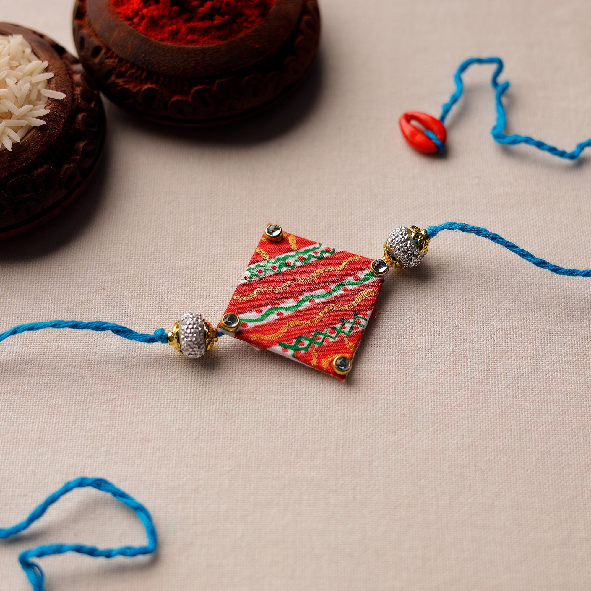 KHUSHBASH - HAPPY LOOM OF EAST Bishnupur Handpainted Fabric Rakhi 09