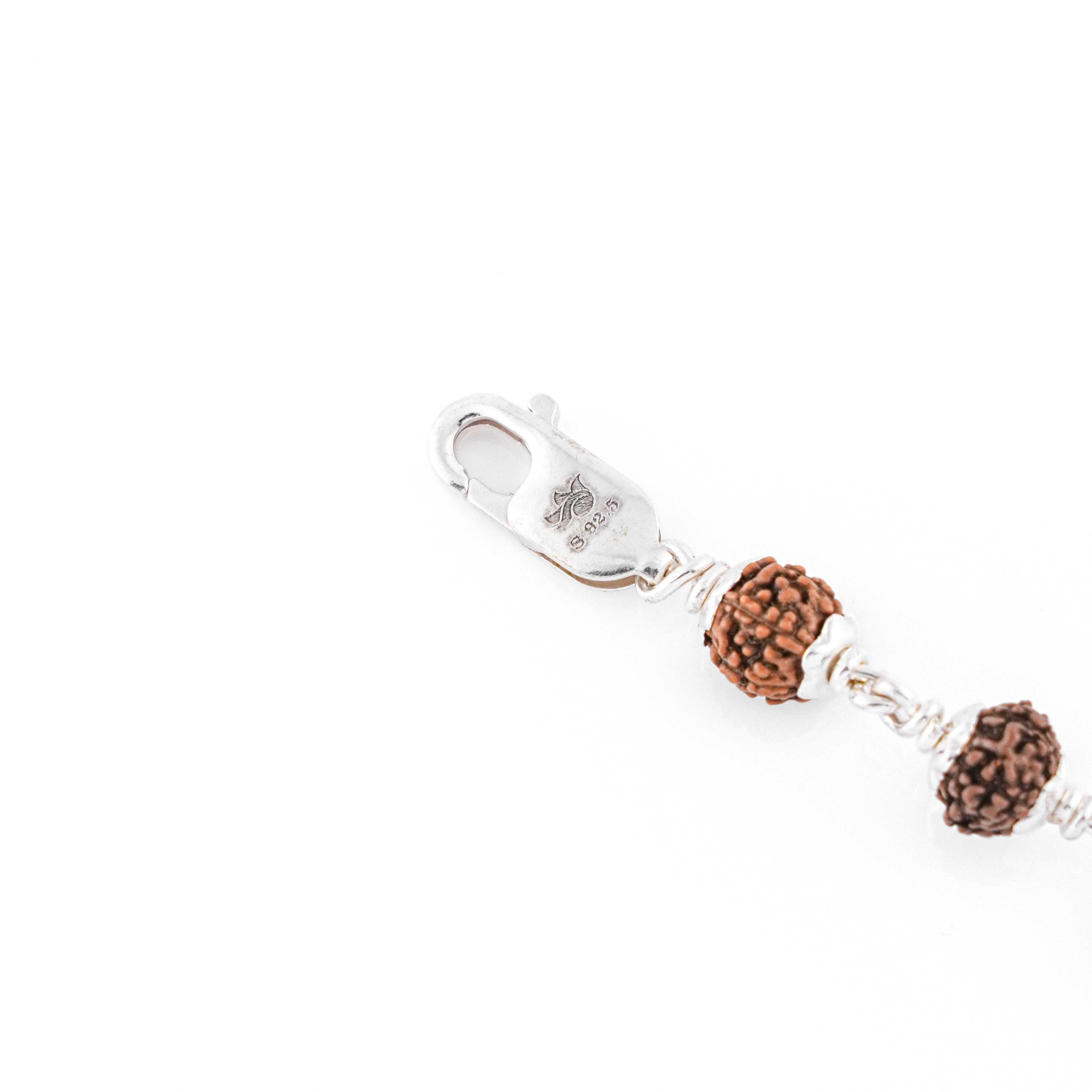 Prinjal Jewellers Silver Rakhi with Rudraksha and Three Diamond Cylinders - view 6