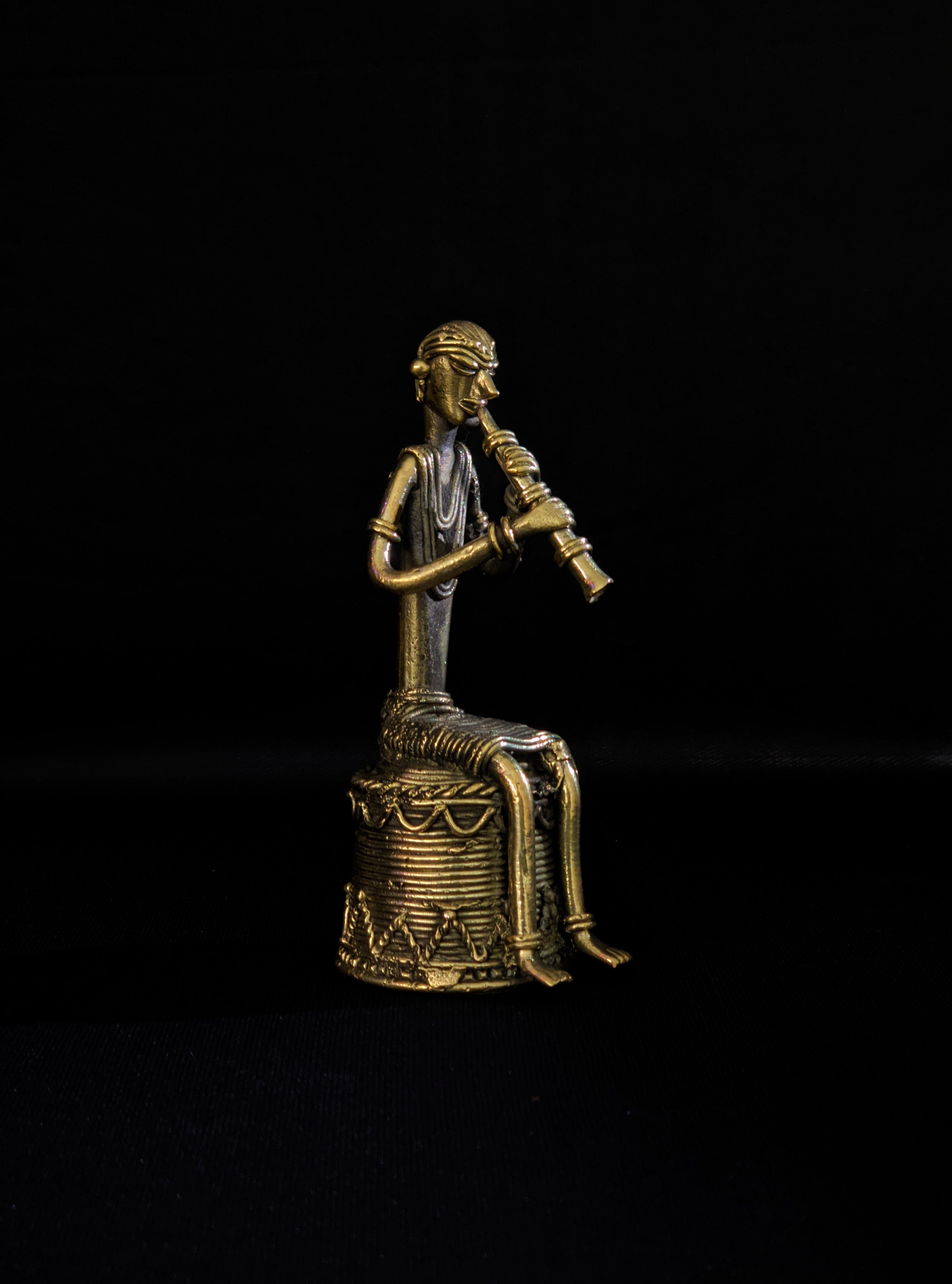 IndianVillèz Handmade Dhokra Tribal Musician Sitting on Base Playing Turi