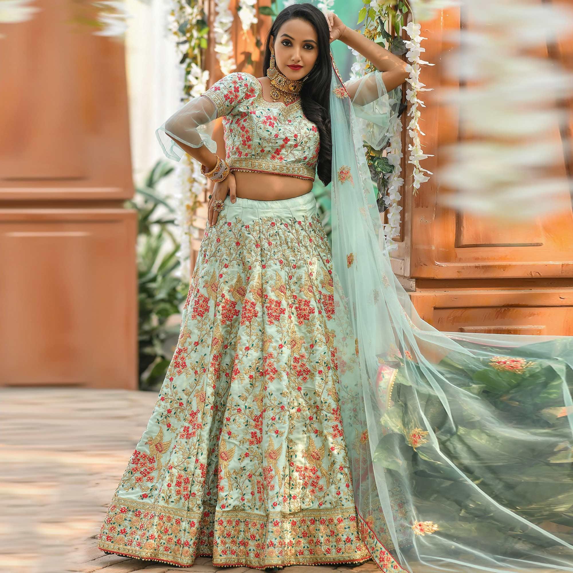Peachmode Flamboyant Blue Colored Wedding Wear Woven Silk Lehenga Choli