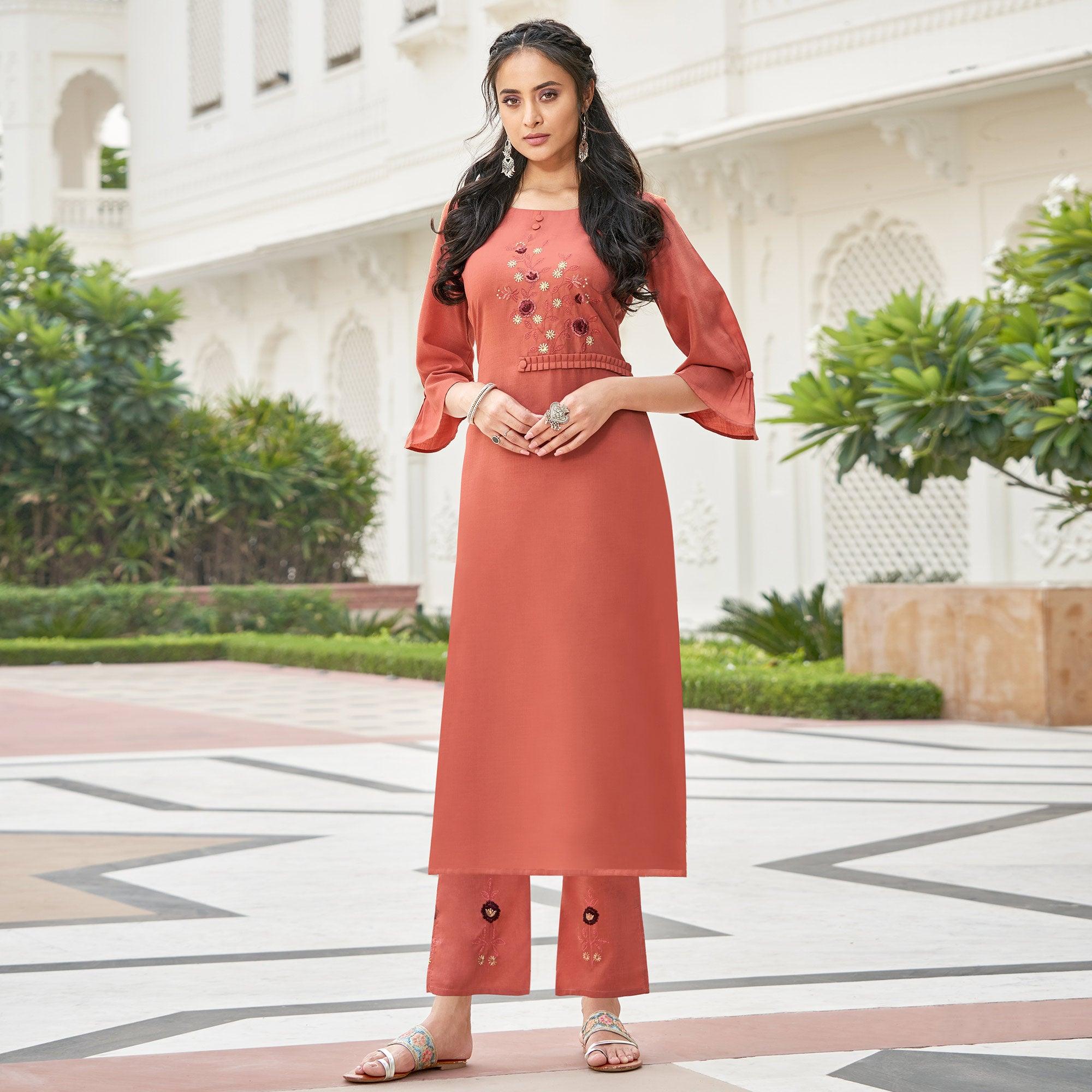 Peachmode Seller Eye-catching Rust Orange Colored Partywear Embroidered Cotton Slub Kurti Palazzo Set