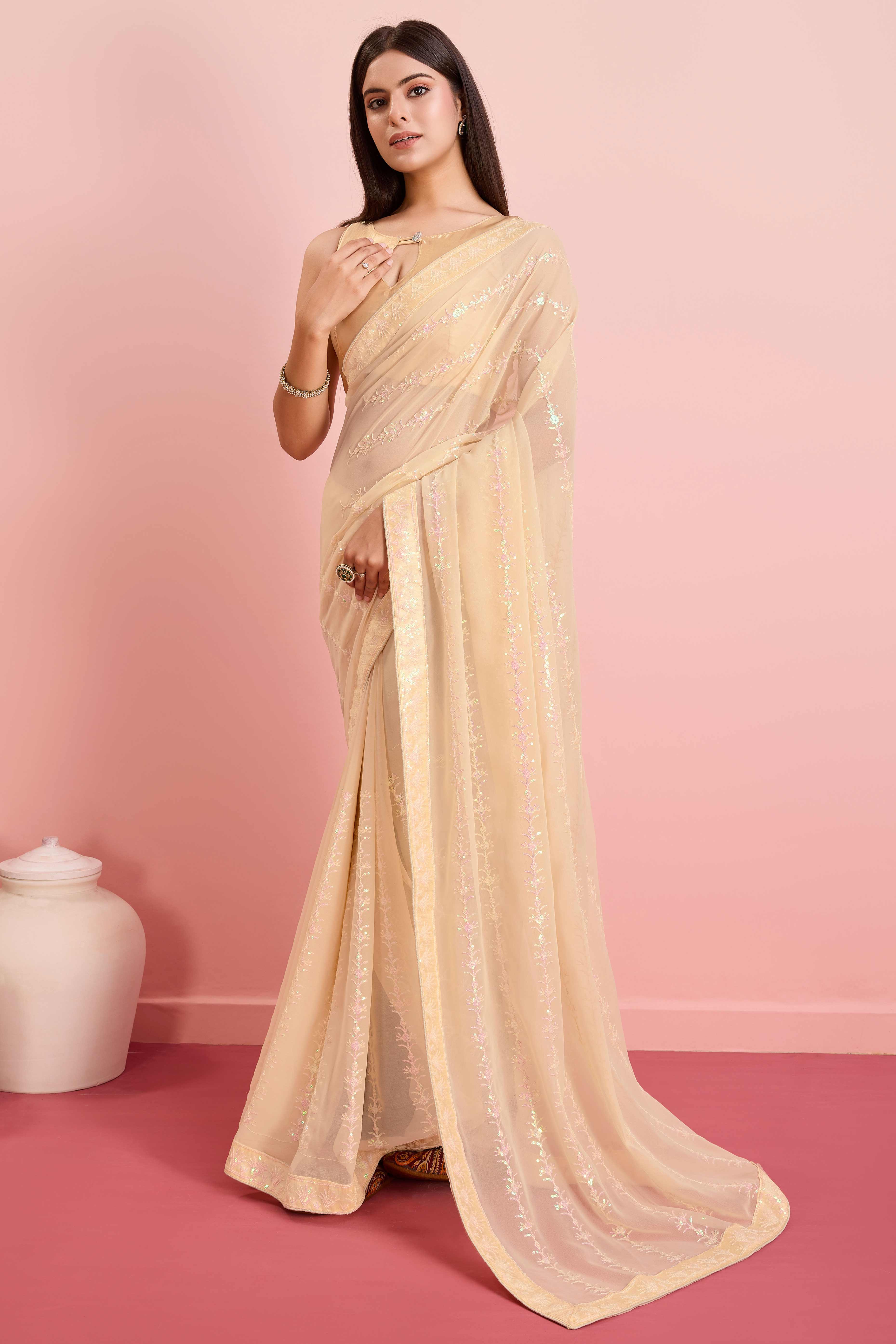 Peachmode Cream Floral Sequins Embroidered Georgette Saree