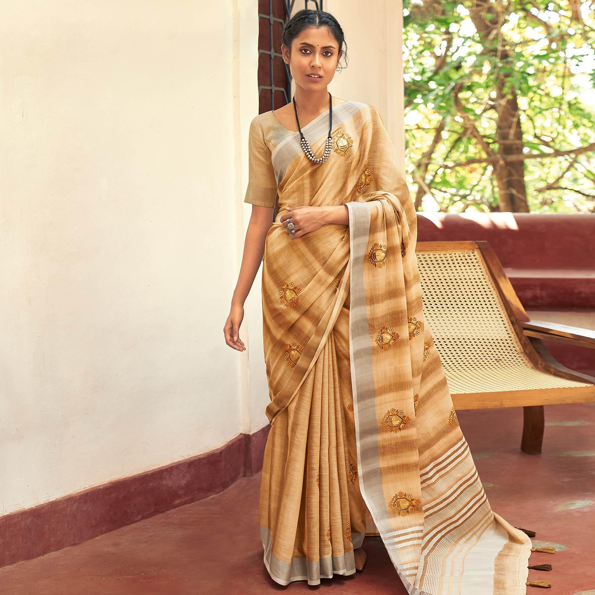 Peachmode Brown Casual Wear Embroidered Linen Saree With Tassels