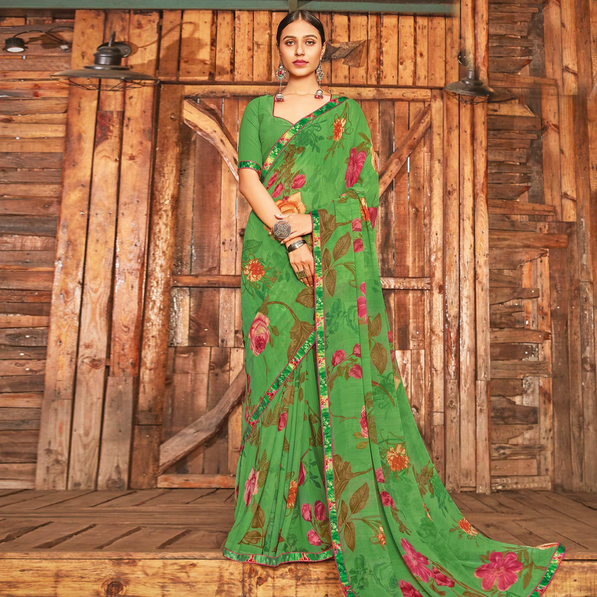Peachmode Breathtaking Green Coloured Partywear Pure Georgette Floral Printed Saree With Fancy Lace Border